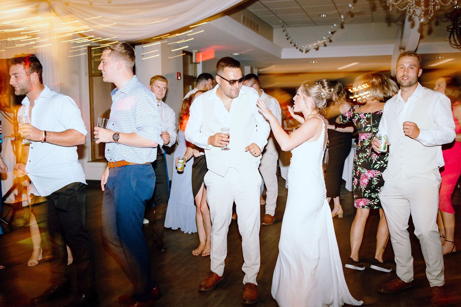 Married couple dancing during reception at Lapeer Country Club wedding in Michigan