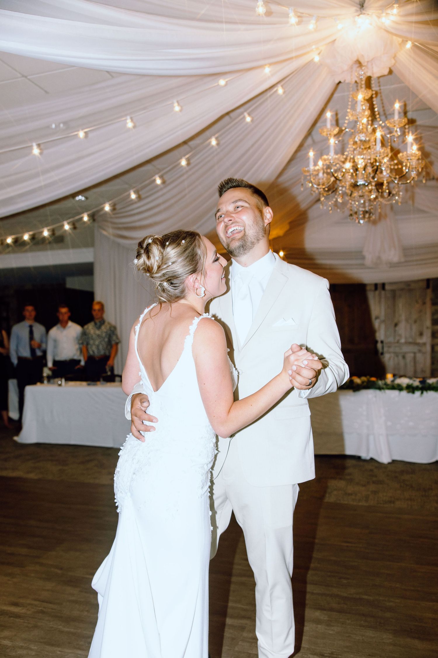 Married couple dancing during reception at Lapeer Country Club wedding in Michigan