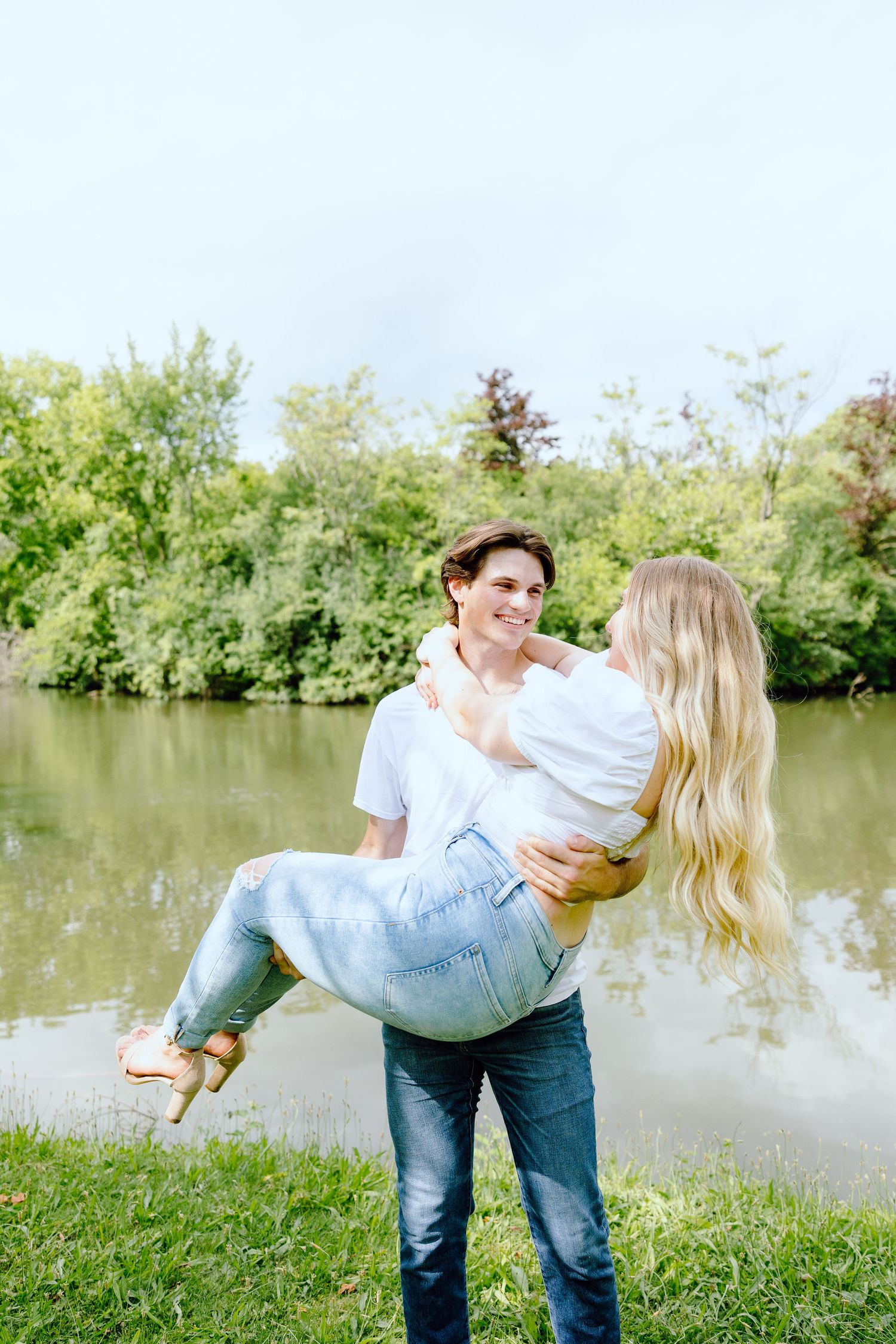 Man lifts his fiancé at Greenfield Village in Dearborn, MI