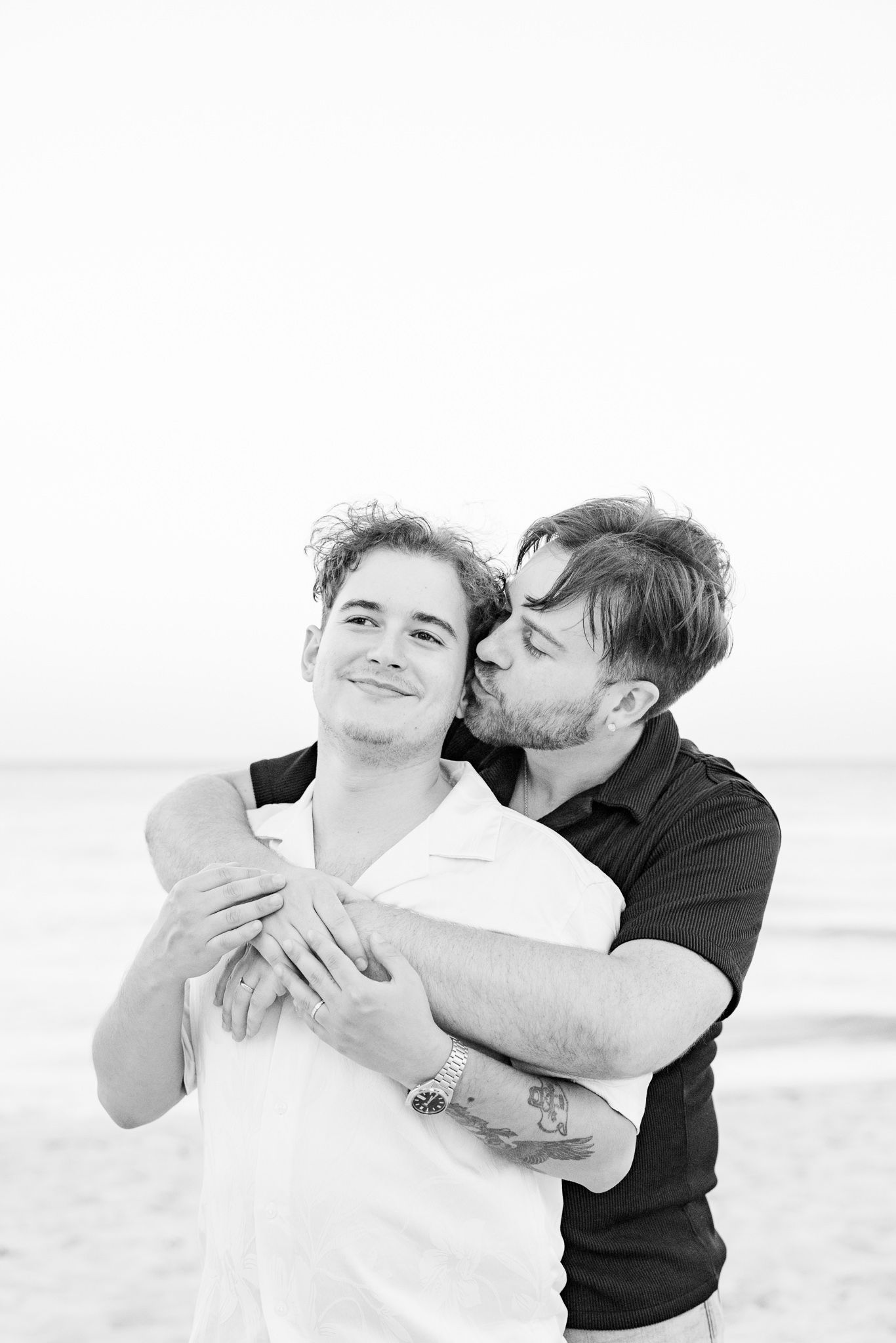 Gay couple embracing at North Miami Beach in Florida