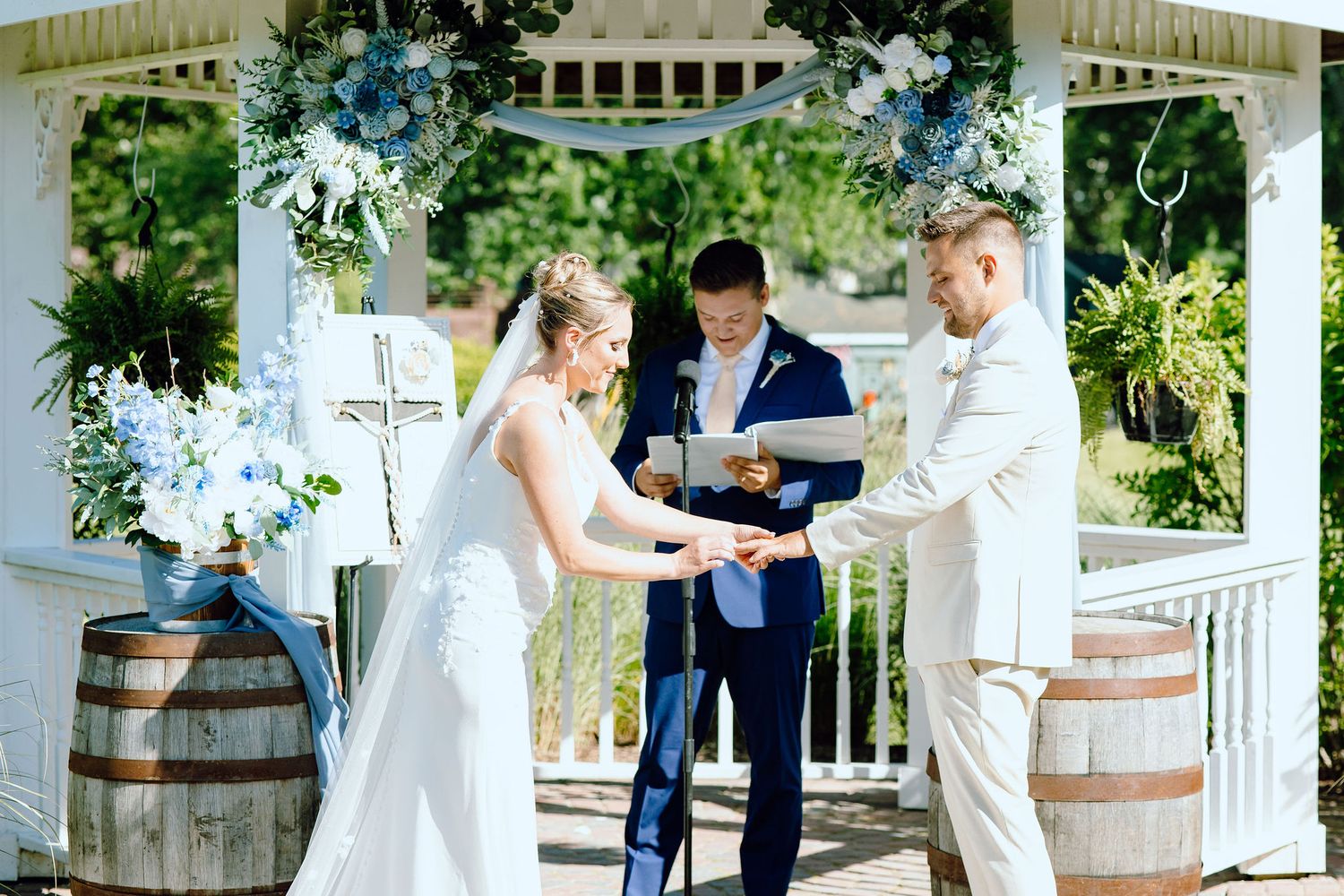 Couple exchanging rings at Lapeer Country Club wedding in Michigan