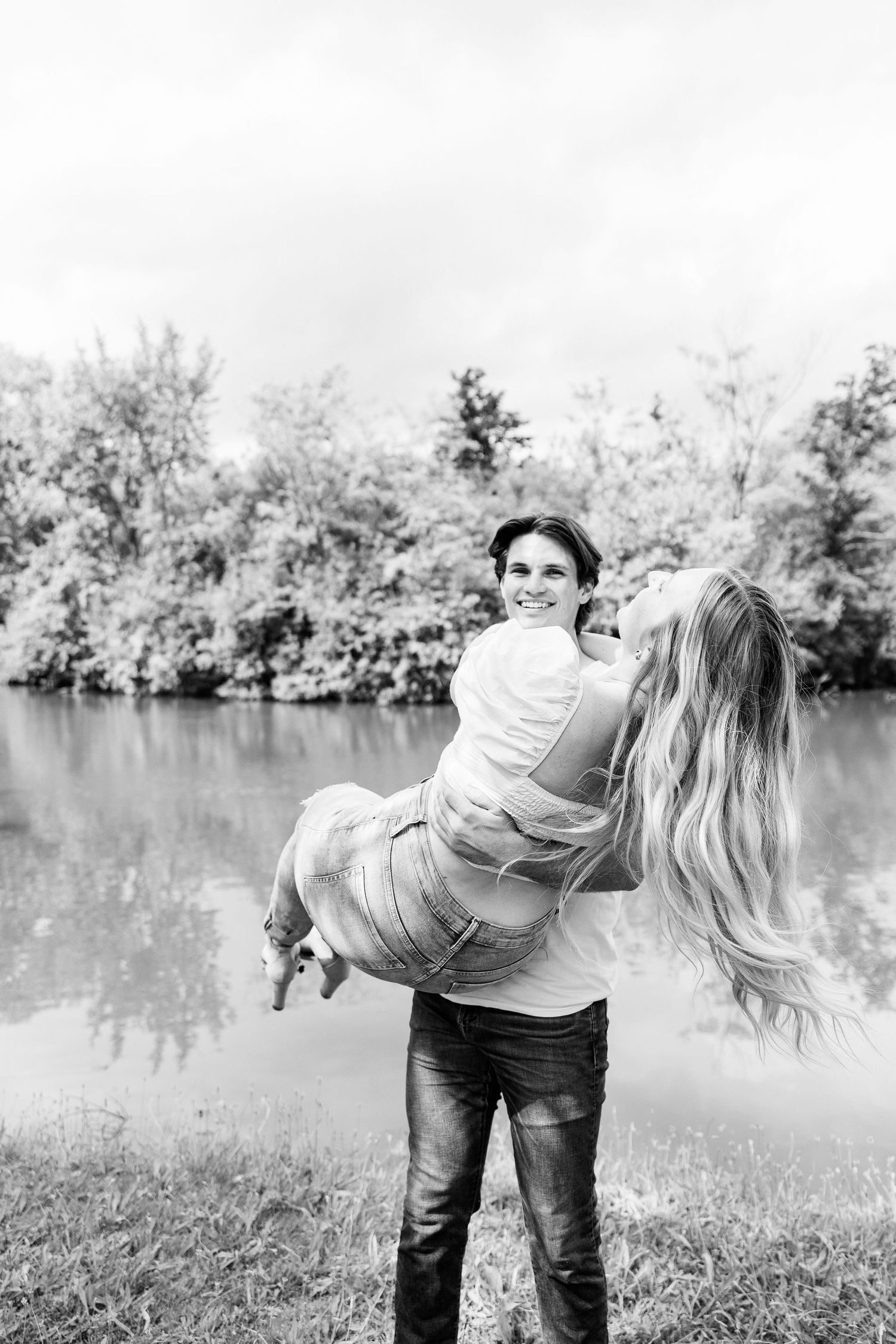 Man lifts his fiancé at Greenfield Village in Dearborn, MI