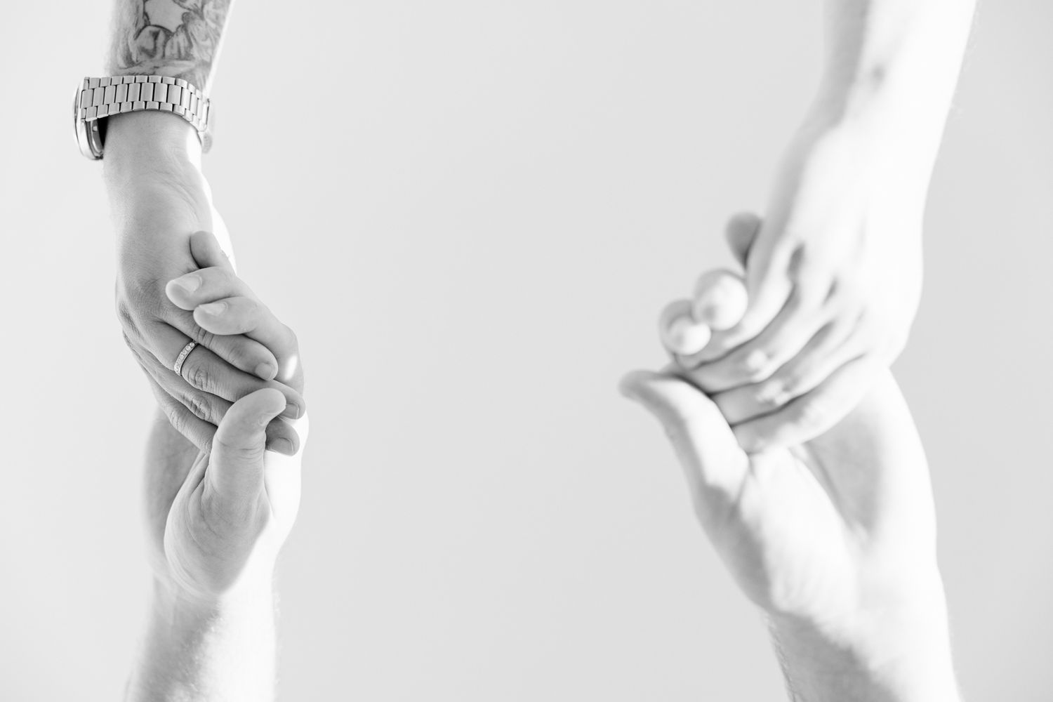 Detail photo of couple's hands and rings in North Miami Beach, Florida