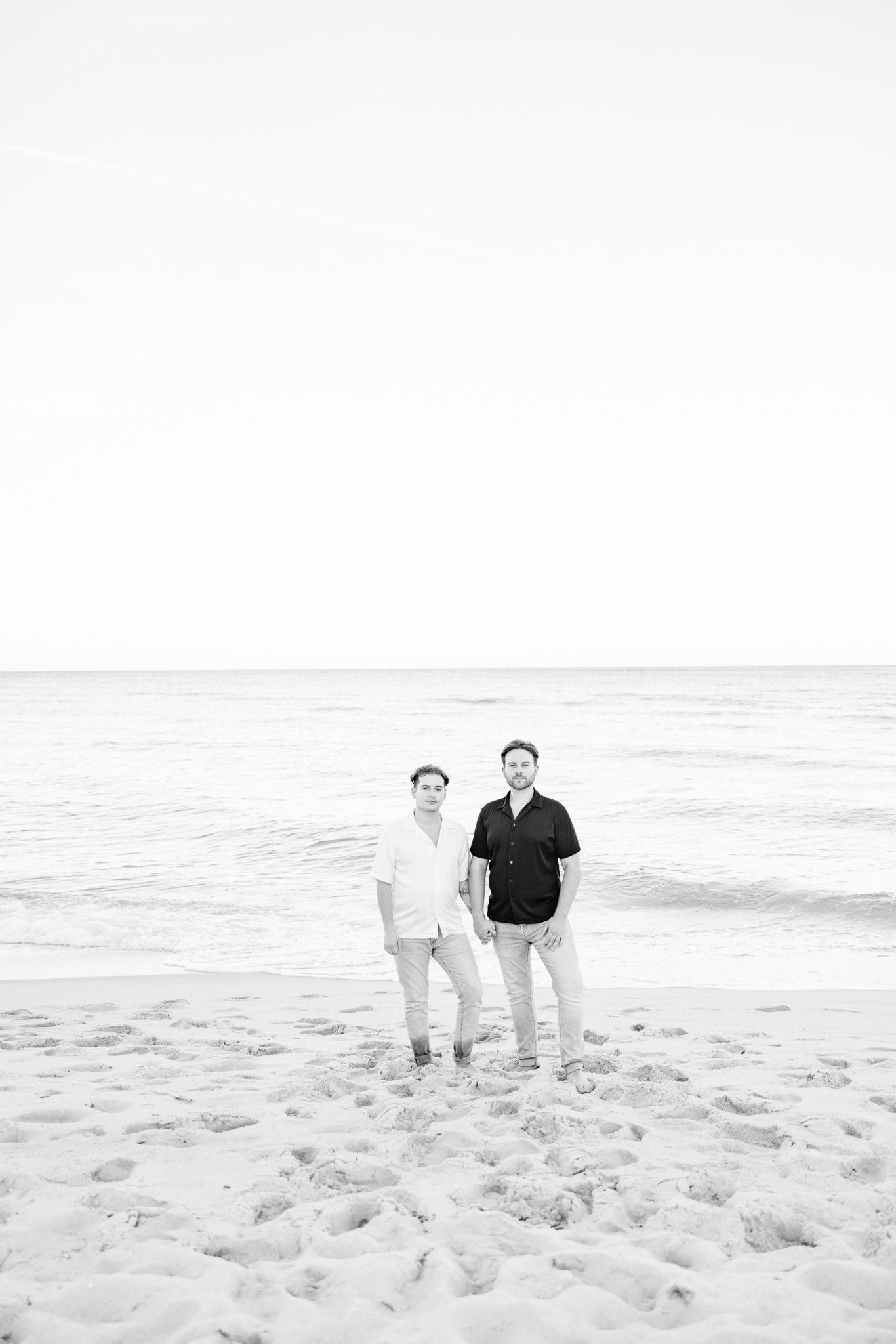 Gay couple holding hands at North Miami Beach in Florida