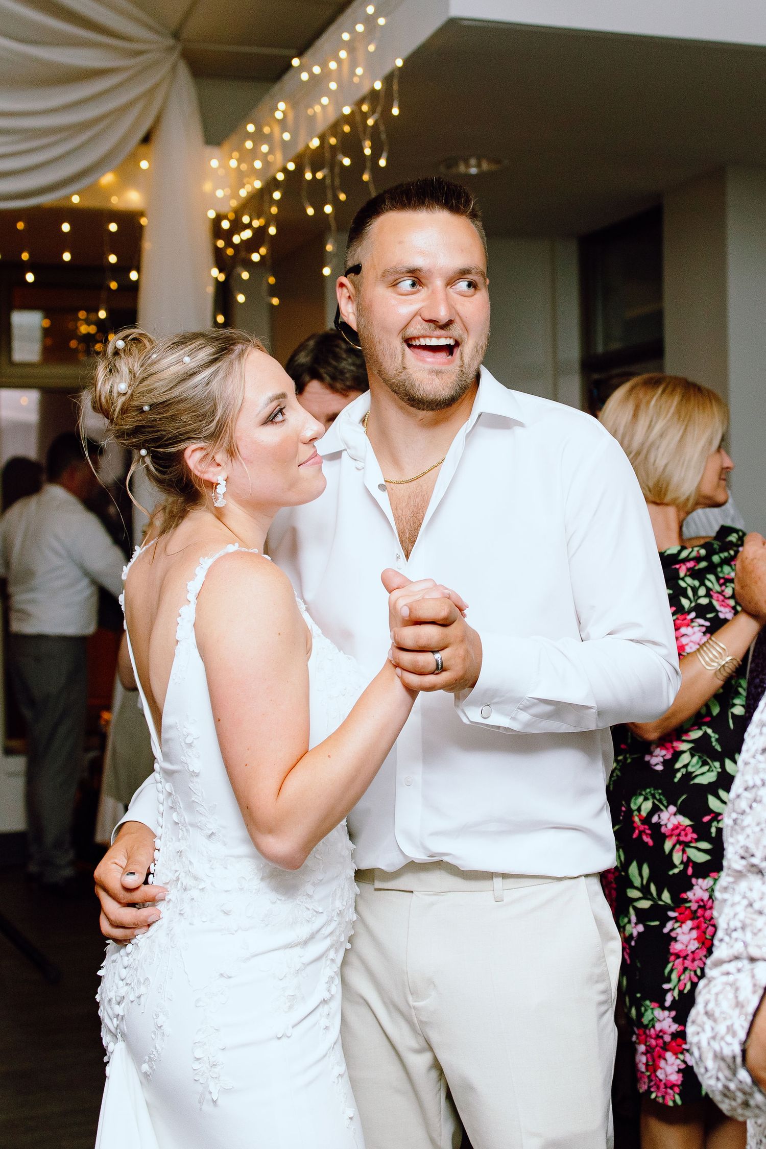 Married couple dancing during reception at Lapeer Country Club wedding in Michigan