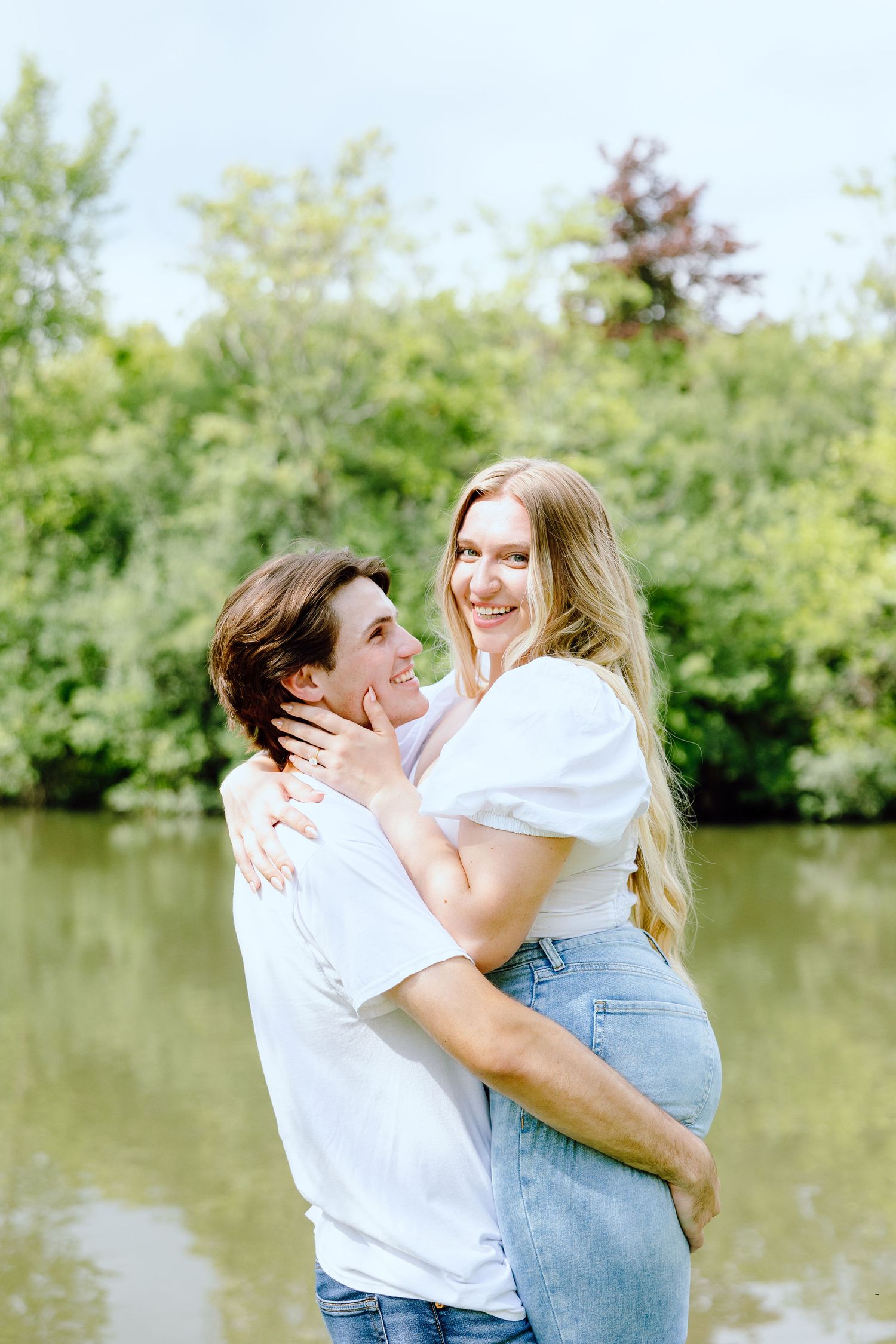 Man lifts his fiancé at Greenfield Village in Dearborn, MI