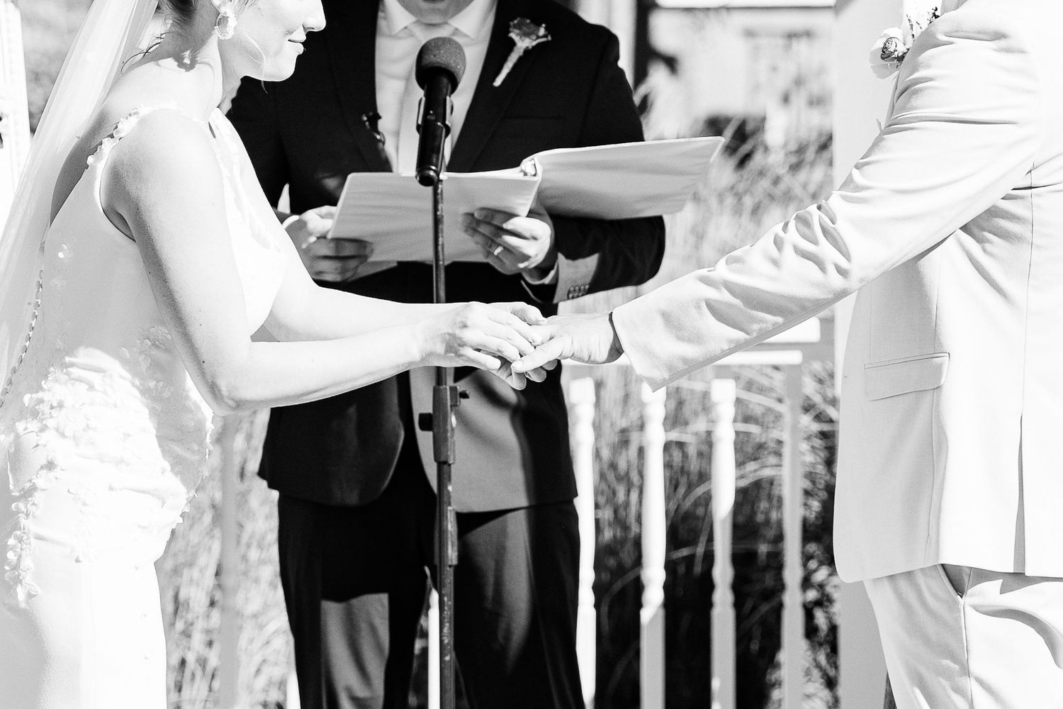 Couple exchanging rings at Lapeer Country Club wedding in Michigan