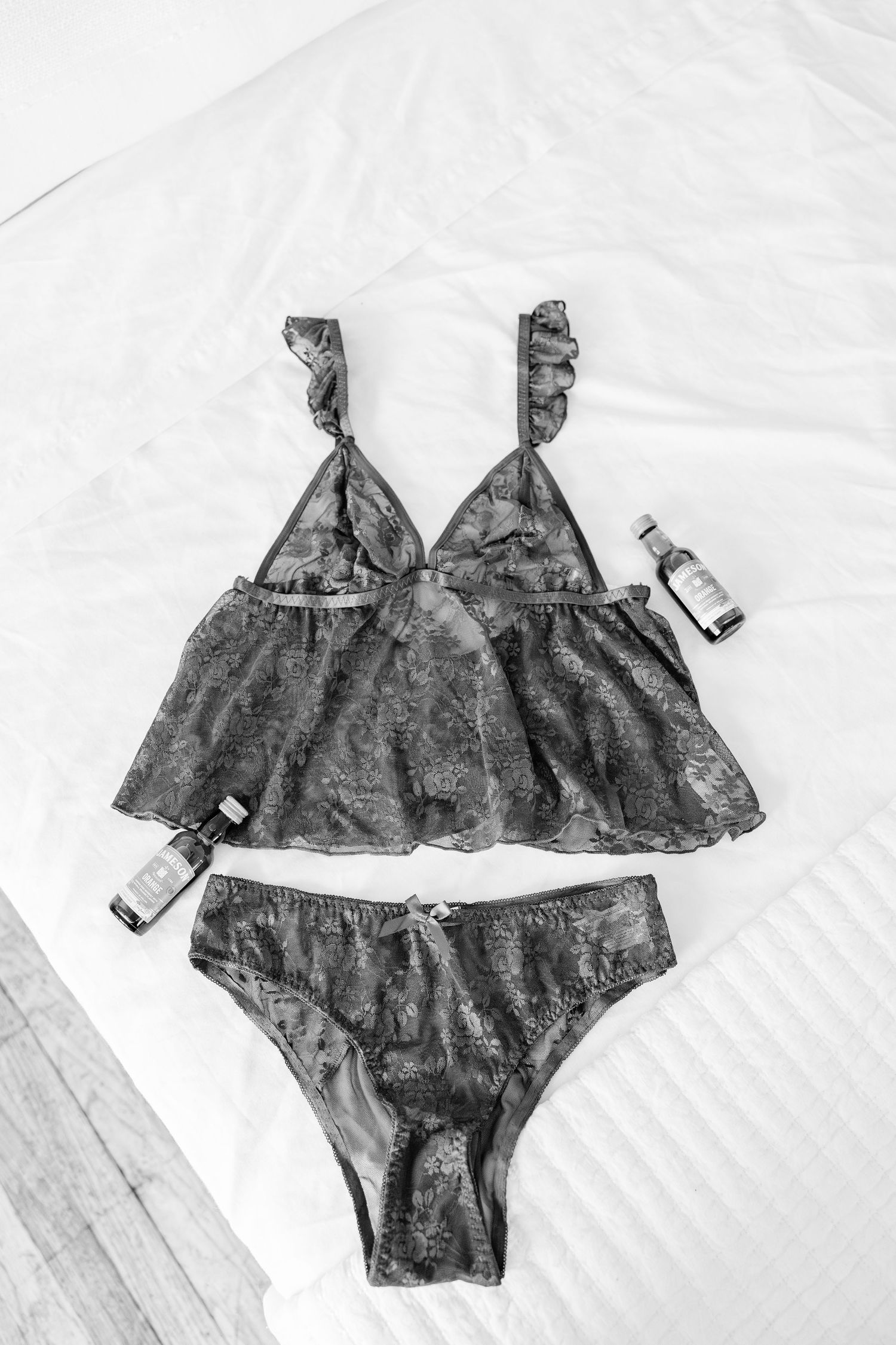 Lingerie on a bed during boudoir session in Royal Oak, MI
