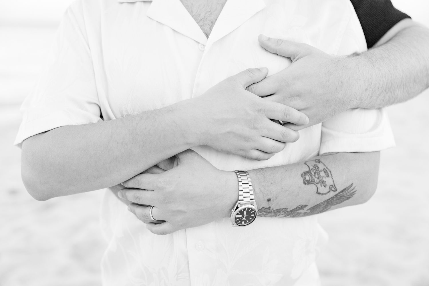 Detail photo of couple's hands and rings in North Miami Beach, Florida