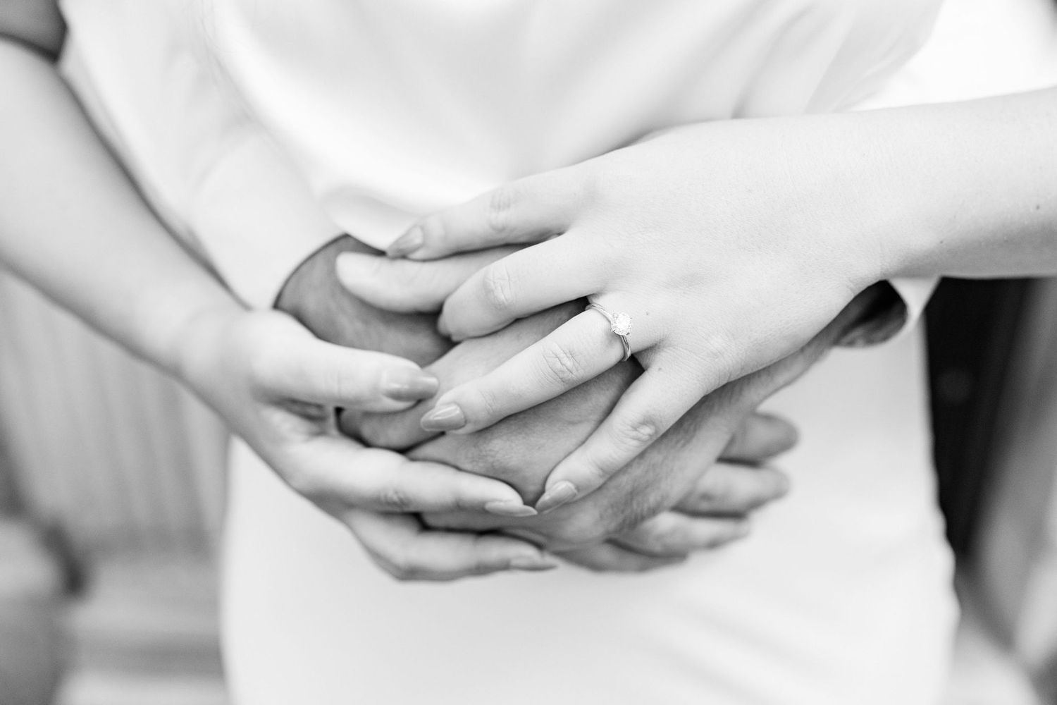Detail photo of engagement ring at the UofM Law Quad in Ann Arbor, MI