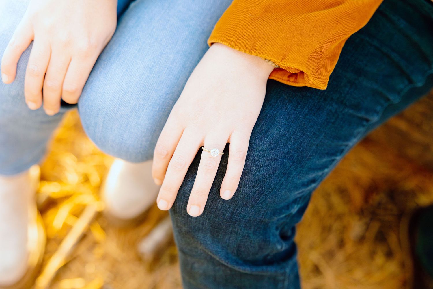 Detail photo of engagement ring at Nichols Arboretum in Ann Arbor, MI