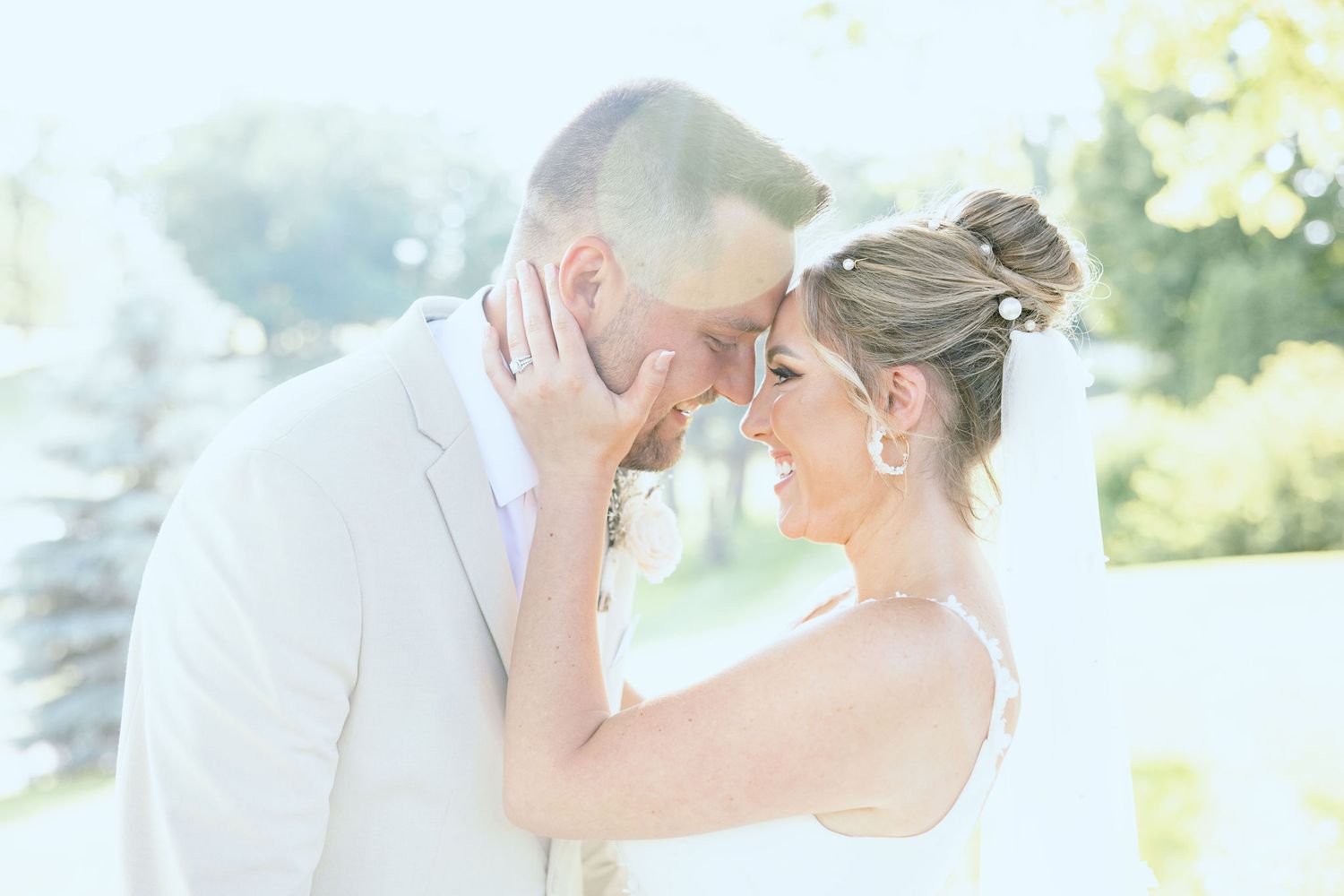 Married couple embracing at Lapeer Country Club wedding in Michigan