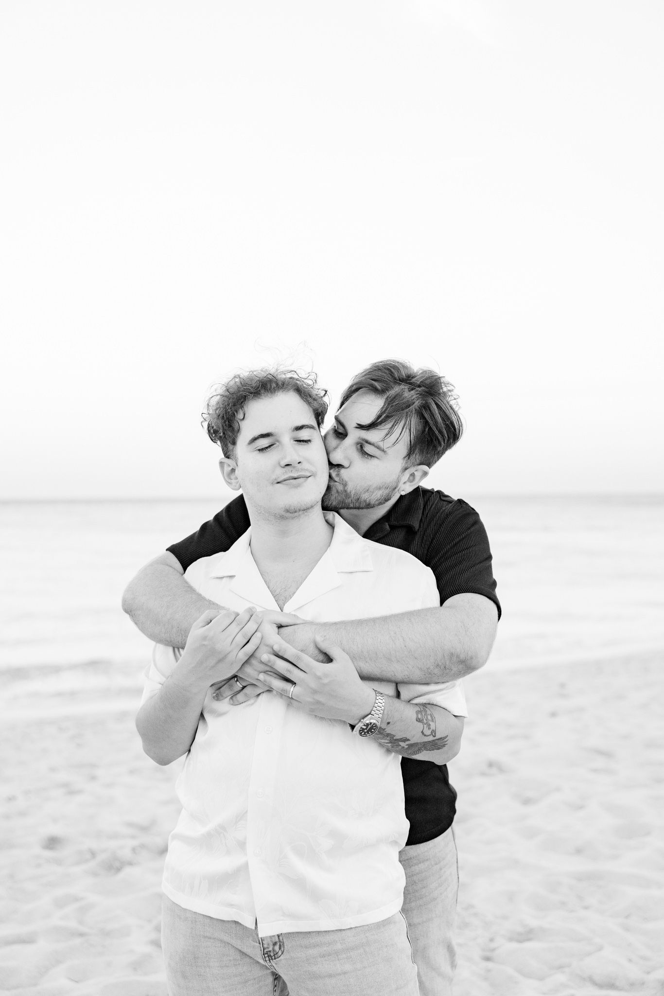 Gay couple embracing at North Miami Beach in Florida