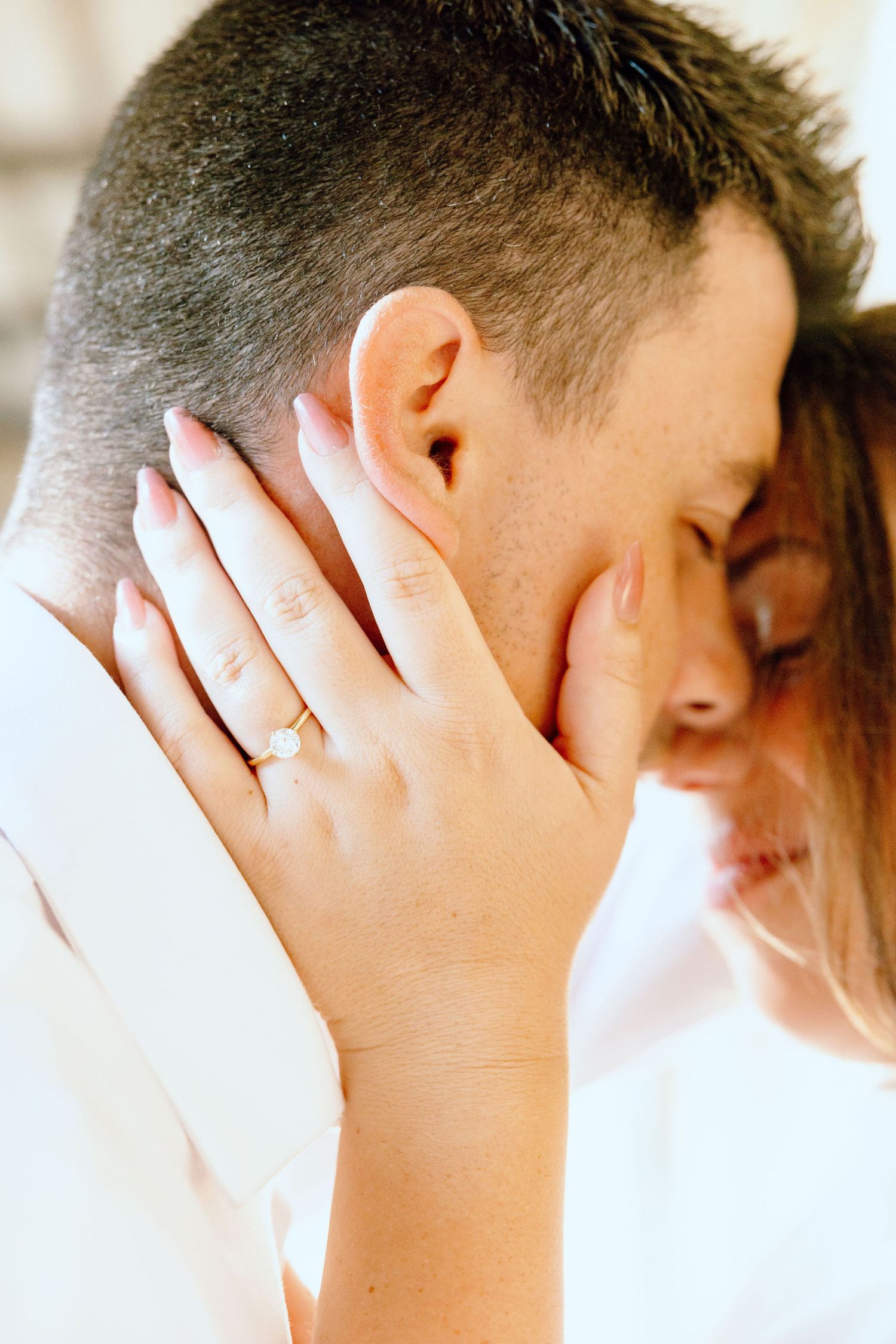 Detail photo of engagement ring at the UofM Law Quad in Ann Arbor, MI