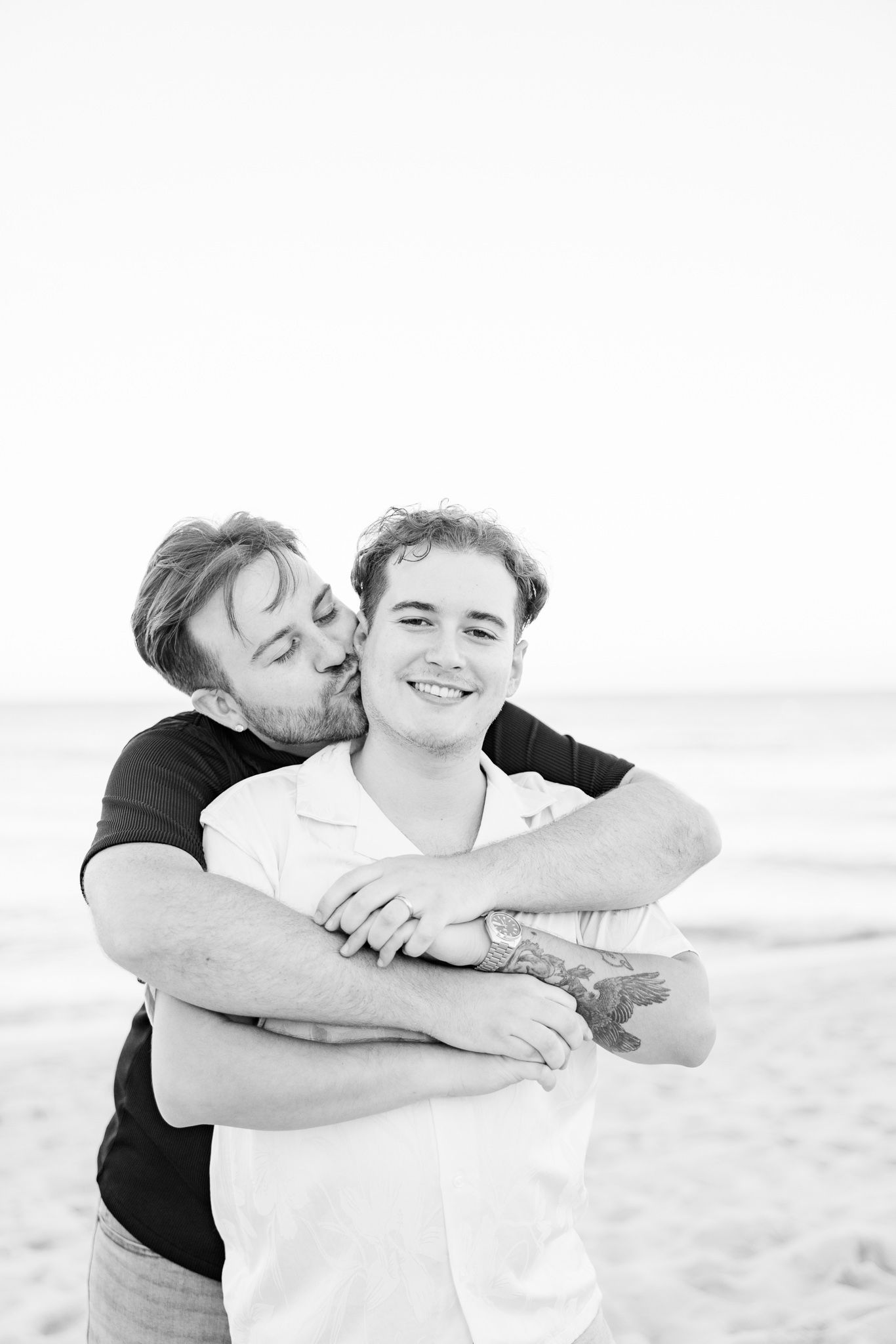 Gay couple embracing at North Miami Beach in Florida
