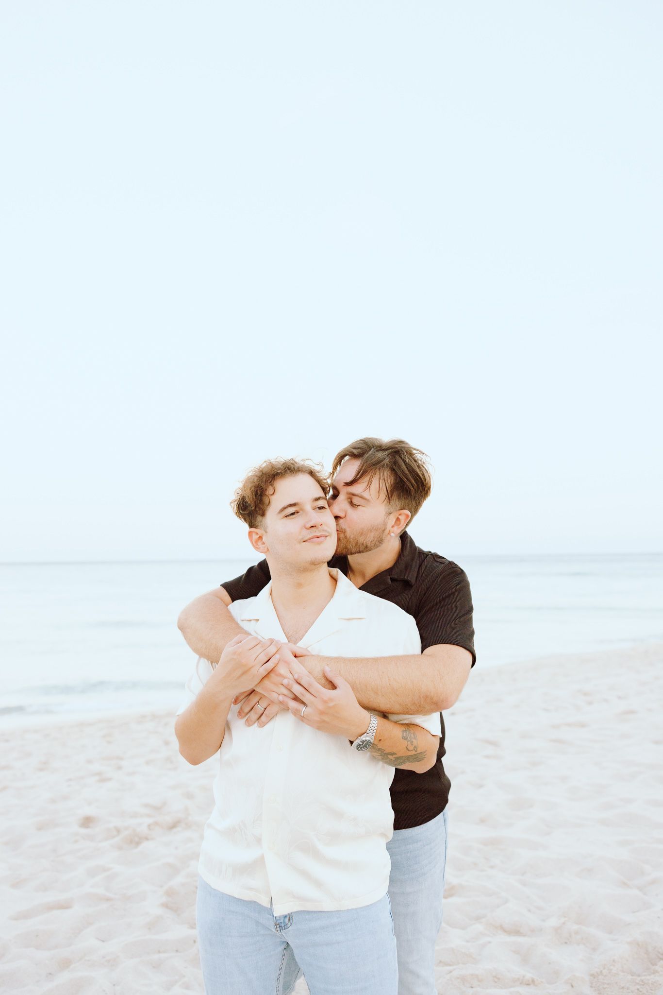 Gay couple embracing at North Miami Beach in Florida