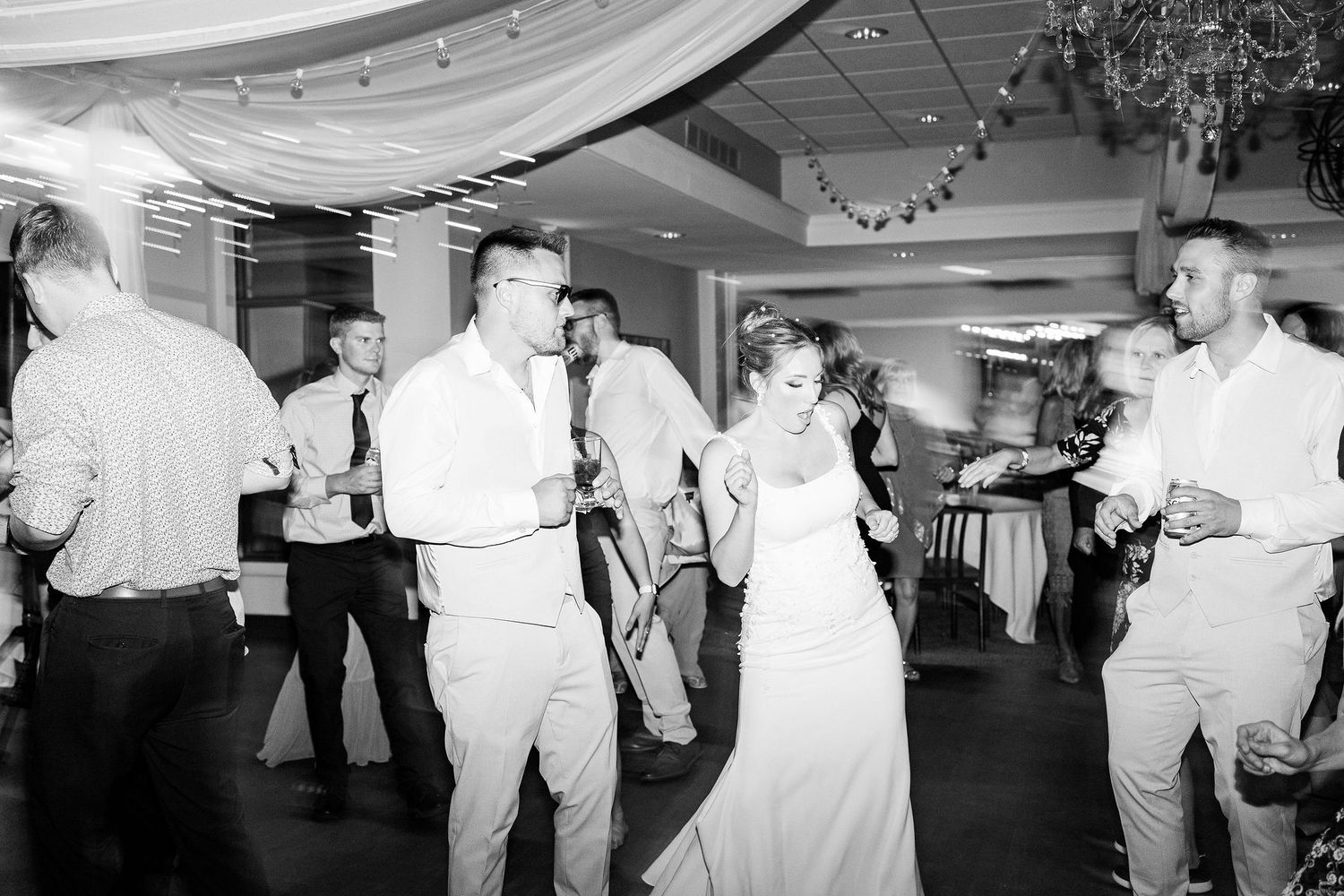 Married couple dancing during reception at Lapeer Country Club wedding in Michigan