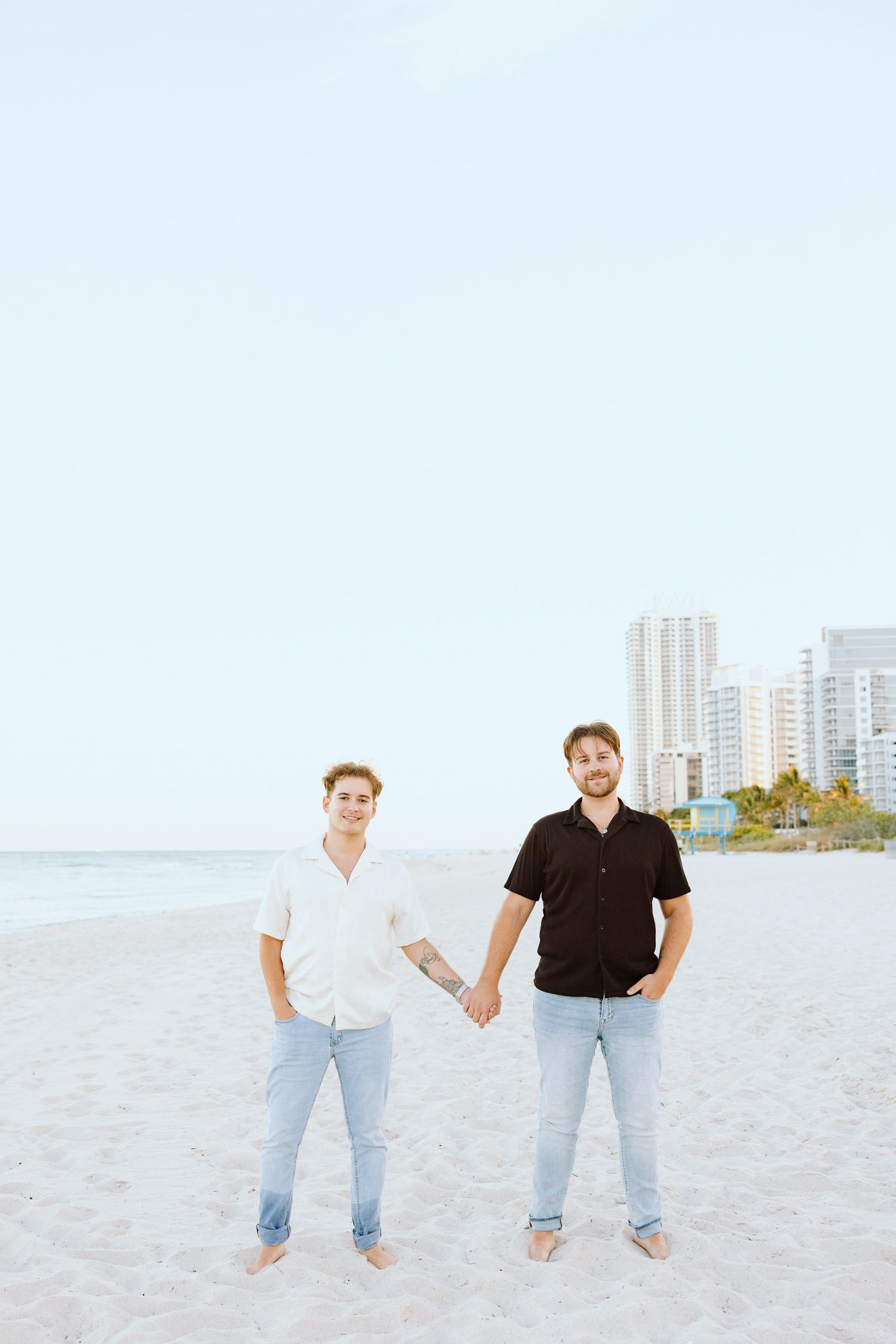 Gay couple holding hands at North Miami Beach in Florida