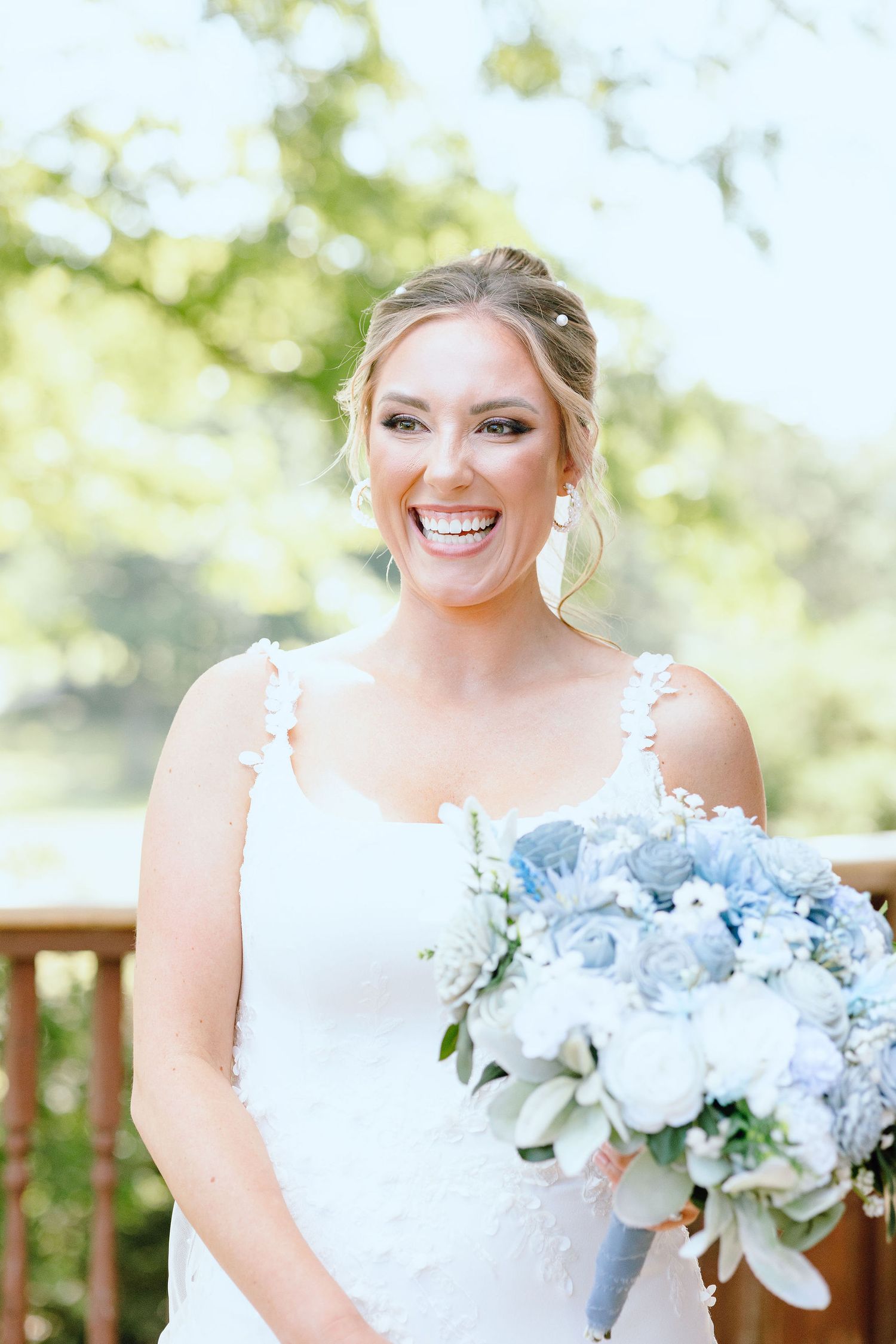 Bride holding bouquet at Lapeer Country Club wedding in Michigan