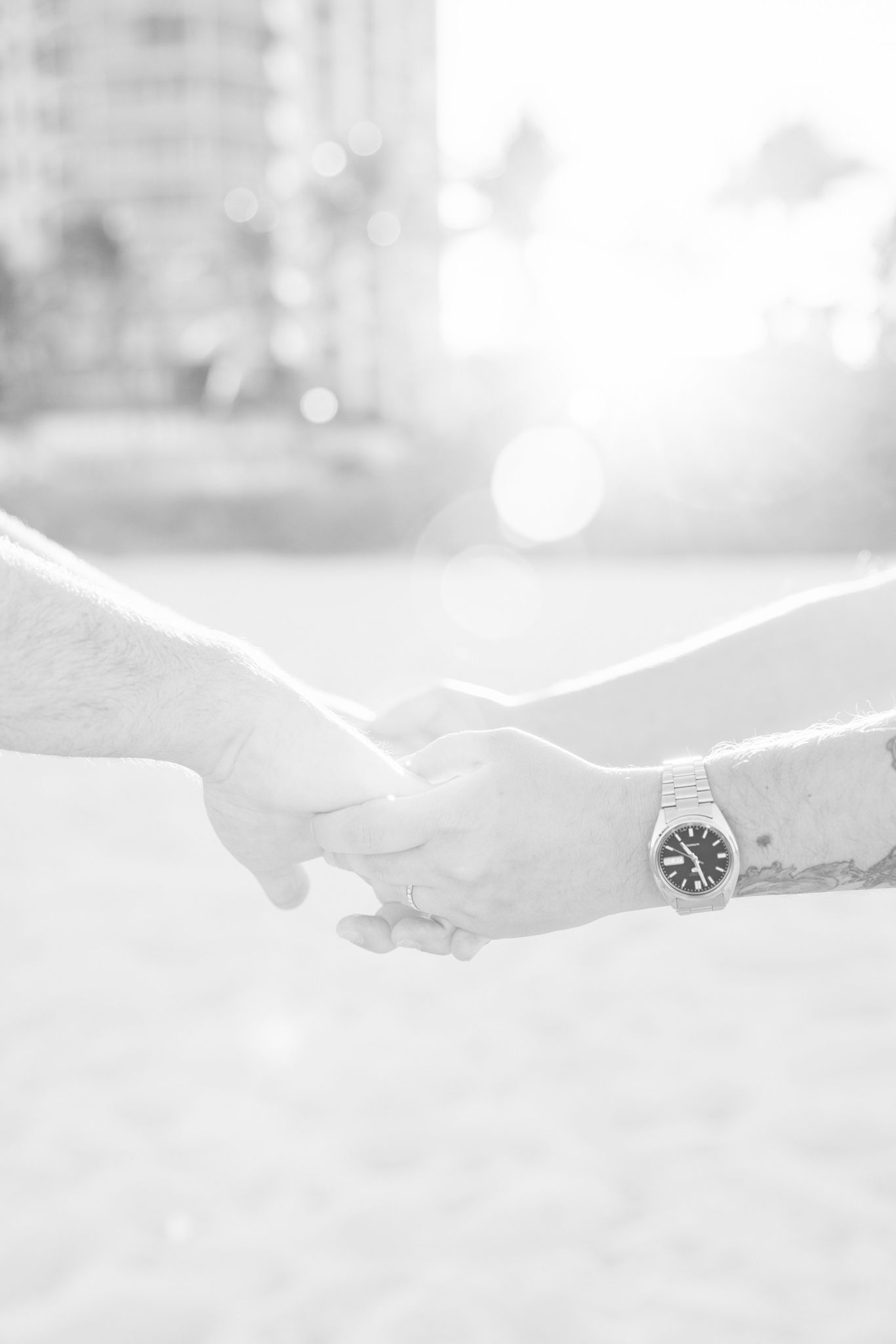Detail photo of couple's hands and rings in North Miami Beach, Florida