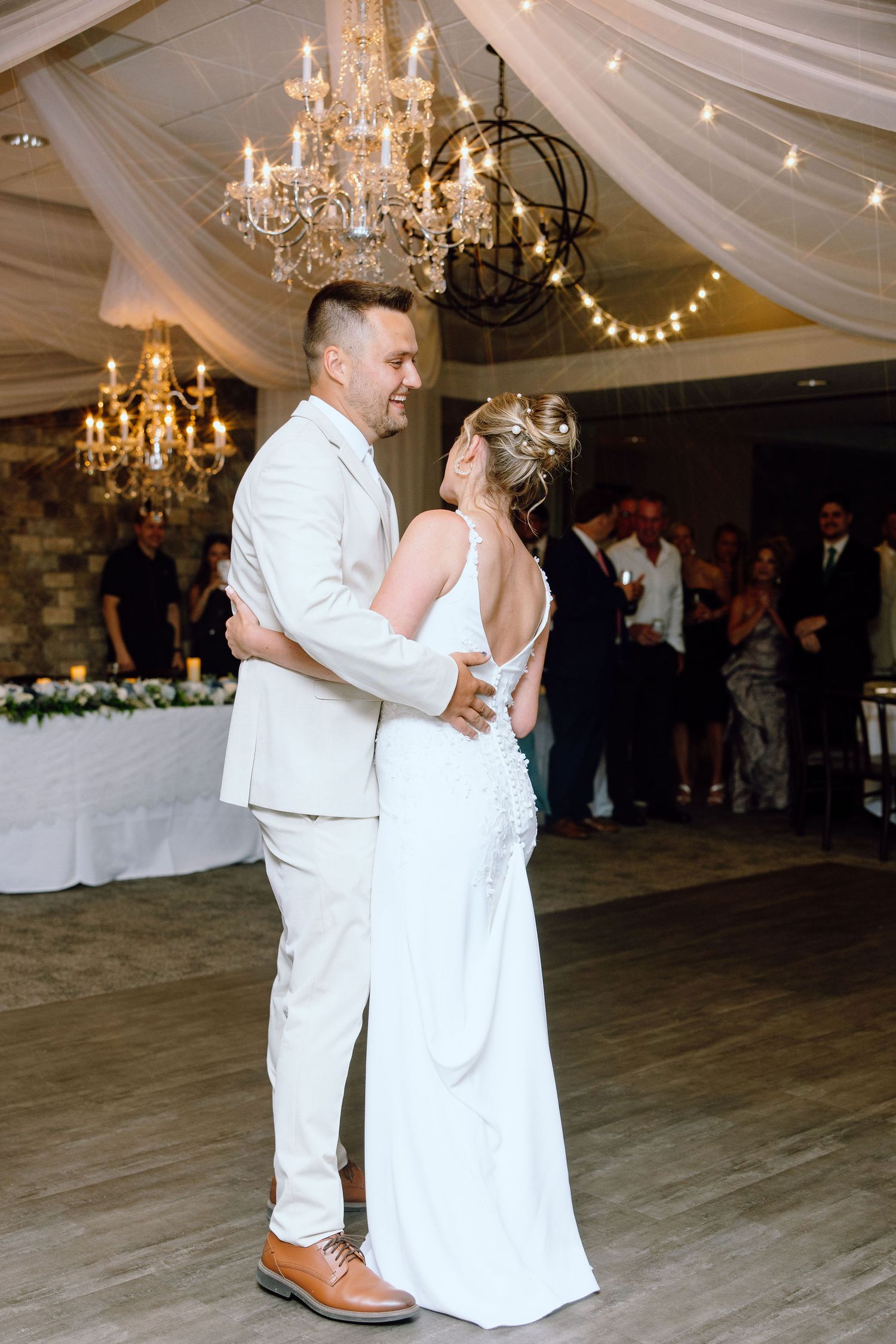 Married couple dancing during reception at Lapeer Country Club wedding in Michigan