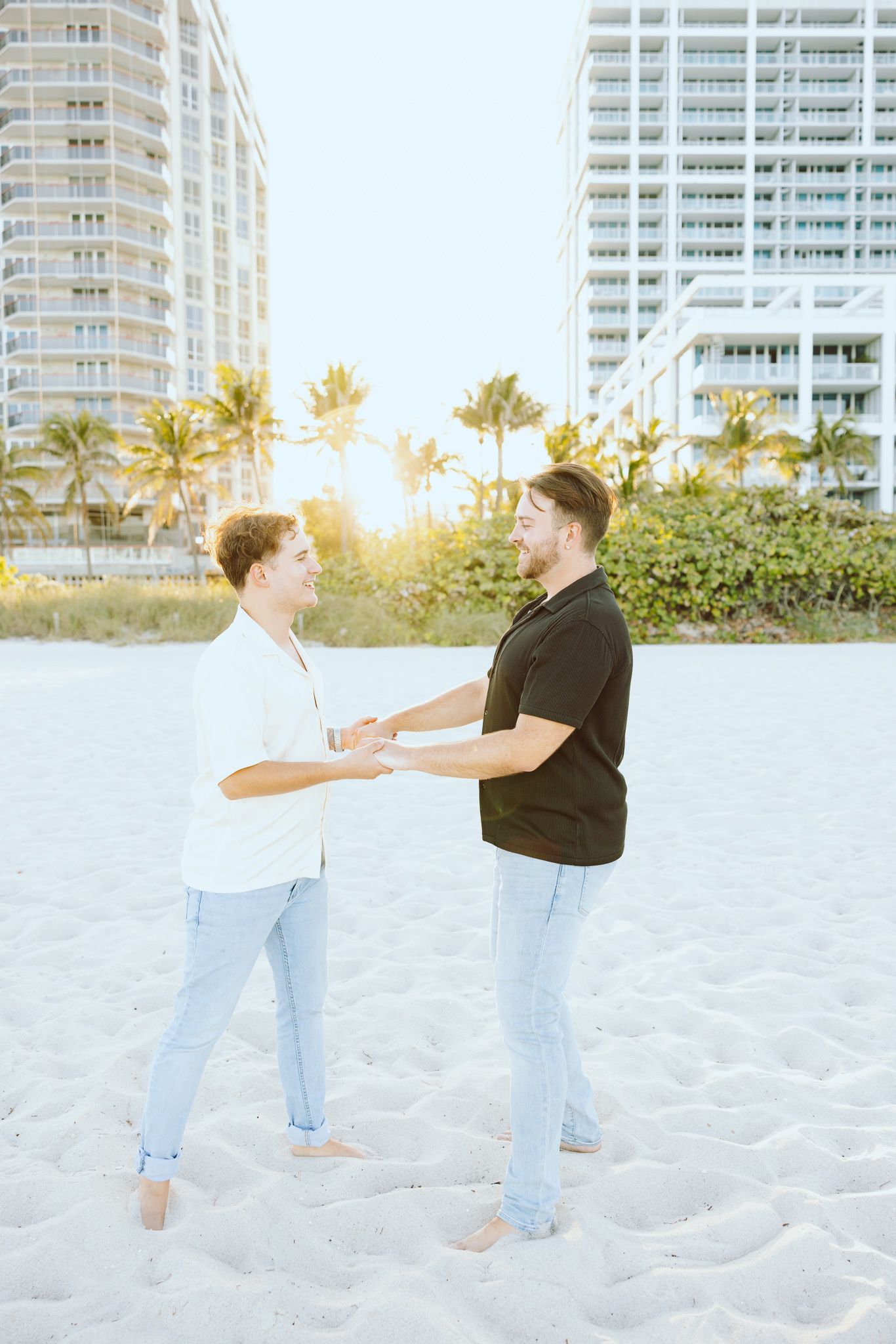 Gay couple holding hands at North Miami Beach in Florida