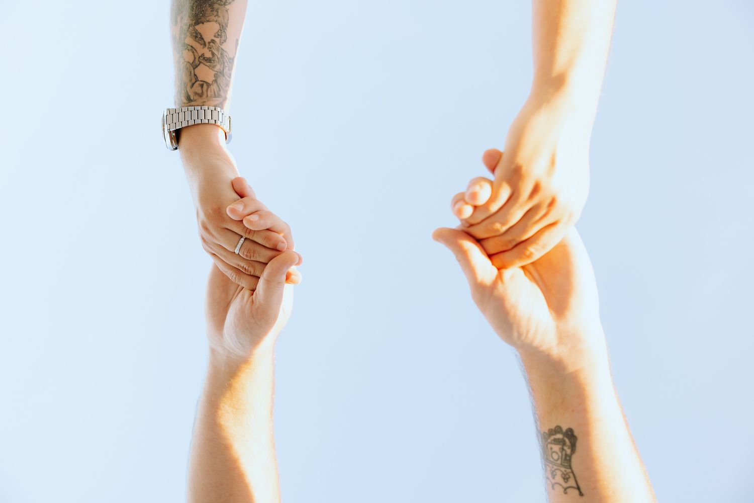 Detail photo of couple's hands and rings in North Miami Beach, Florida