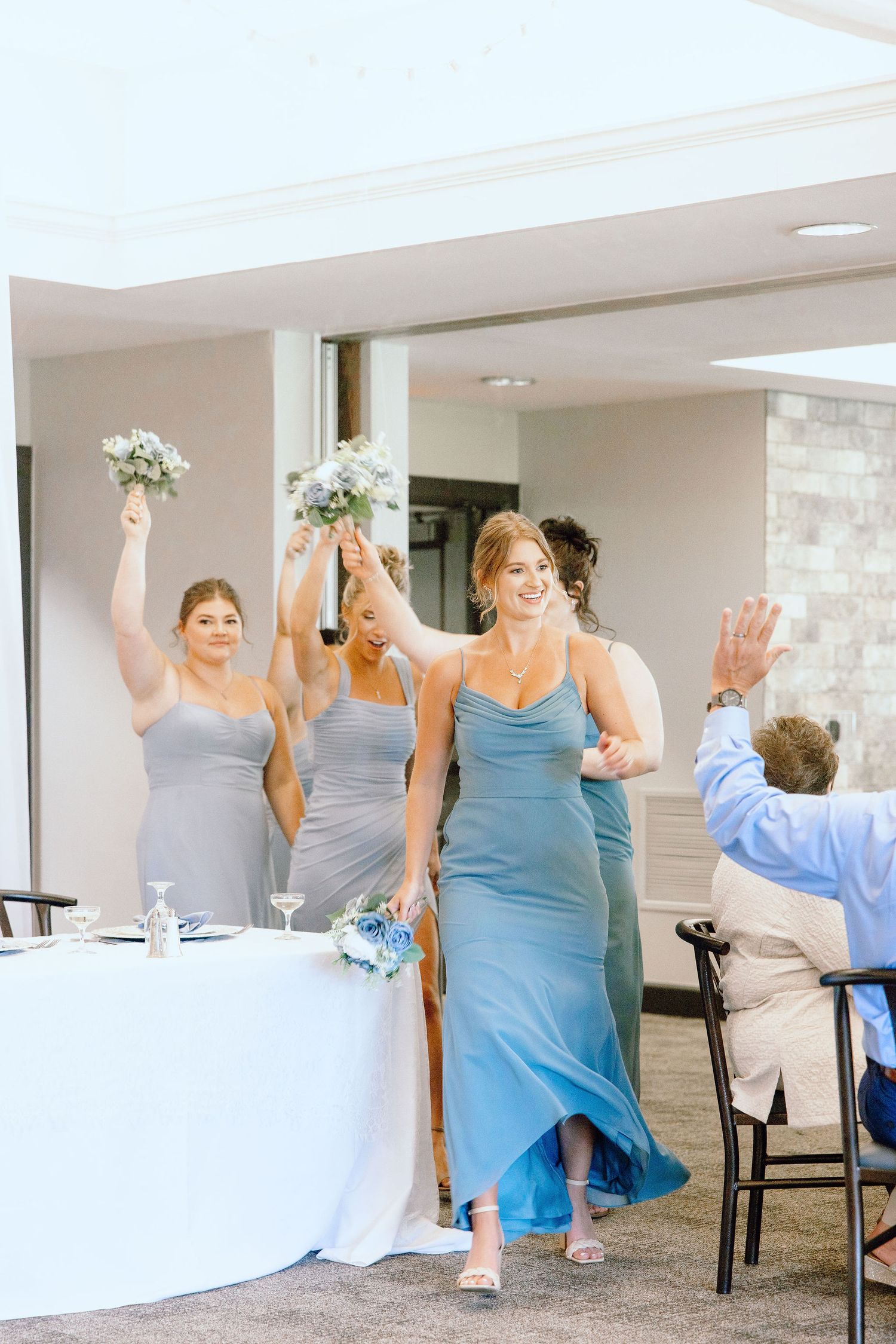 Wedding party entering reception at Lapeer Country Club wedding in Michigan