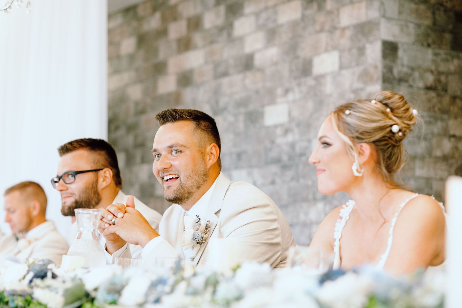 Bride and groom's reaction to Father of the bride speech at Lapeer Country Club wedding in Michigan