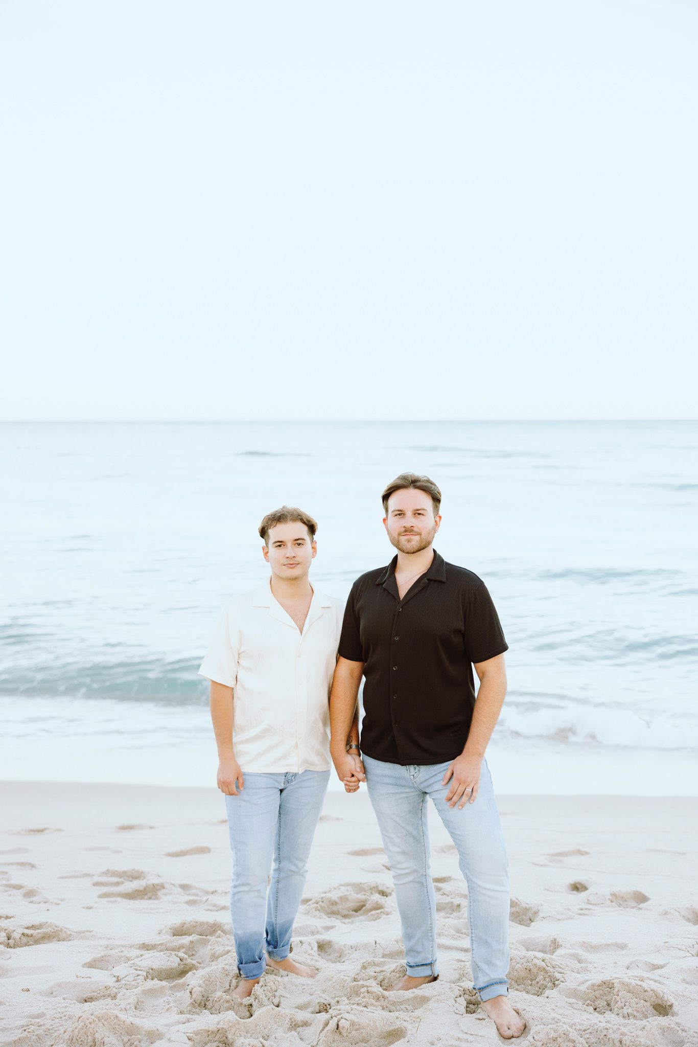 Gay couple holding hands at North Miami Beach in Florida