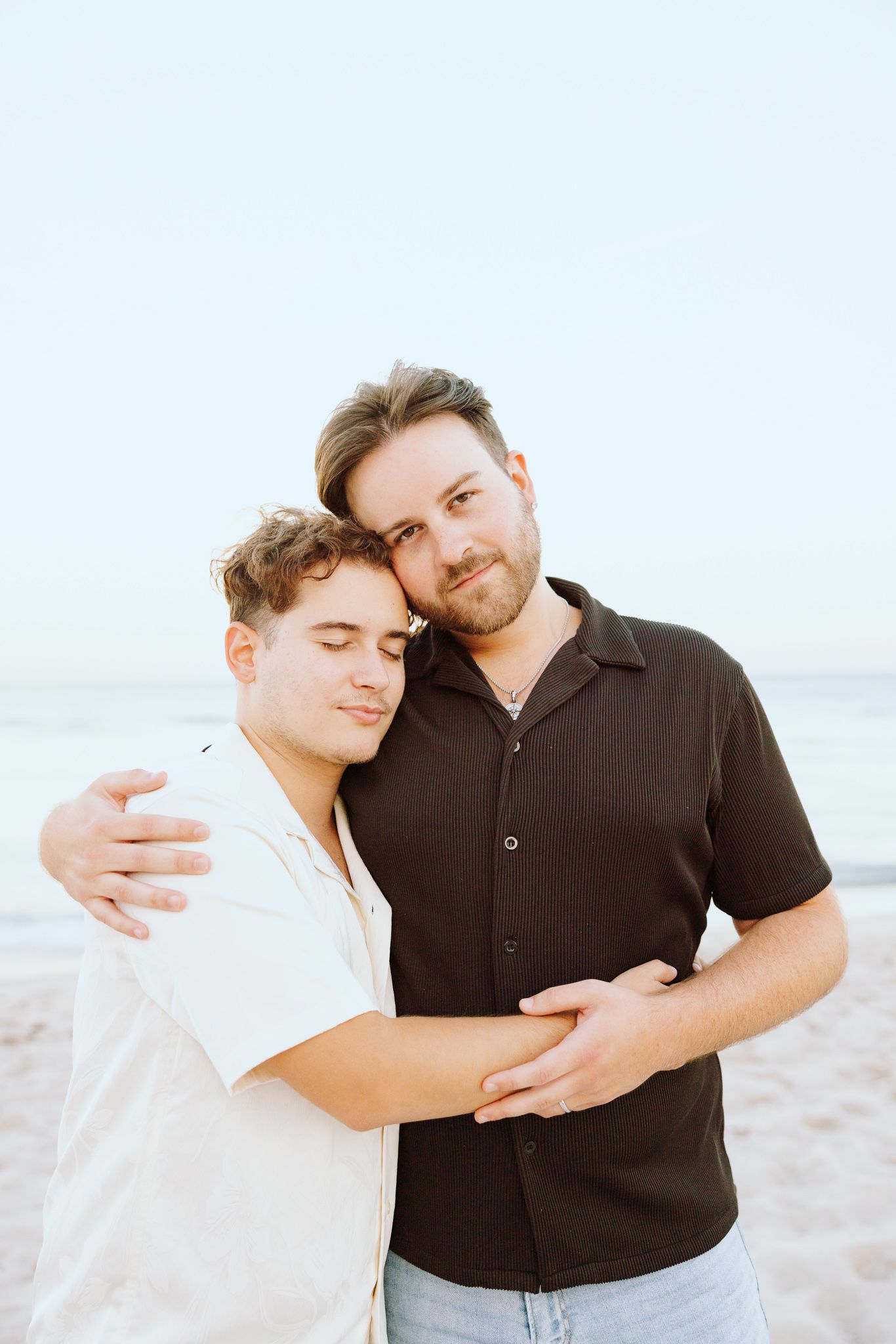 Gay couple embracing at North Miami Beach in Florida