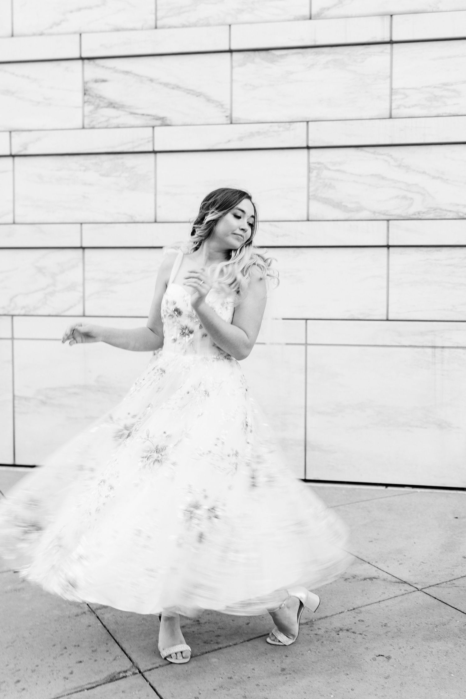 Engaged couple swing dancing at Detroit Institute of Arts engagement session in Detroit, MI