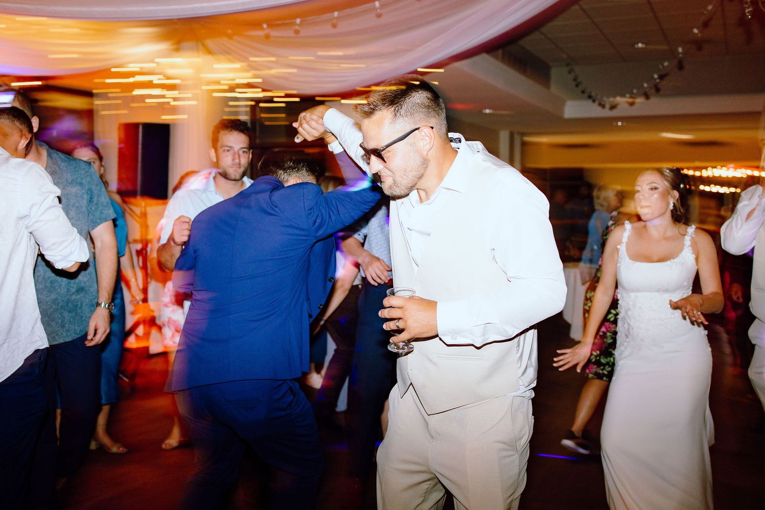 Married couple dancing during reception at Lapeer Country Club wedding in Michigan