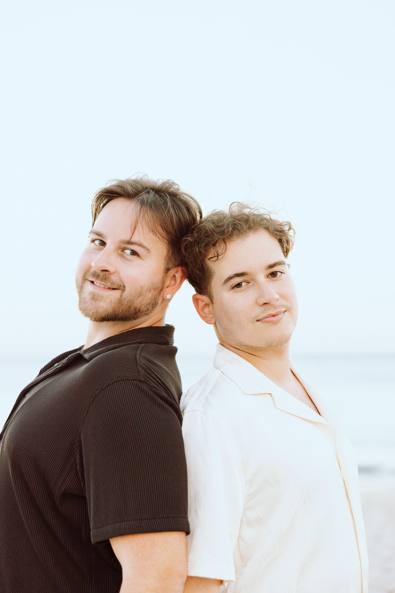 LGBTQ+ standing back to back on North Miami Beach in Florida