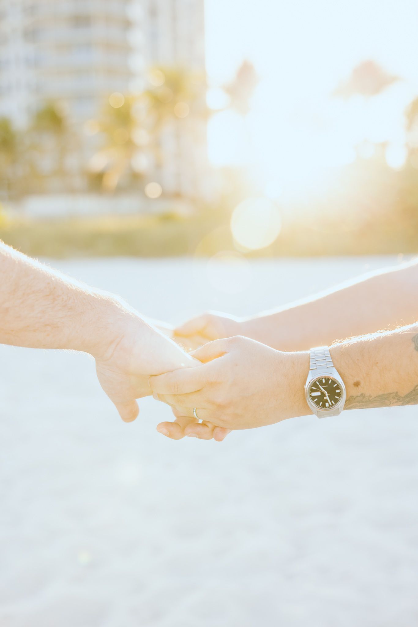 Detail photo of couple's hands and rings in North Miami Beach, Florida