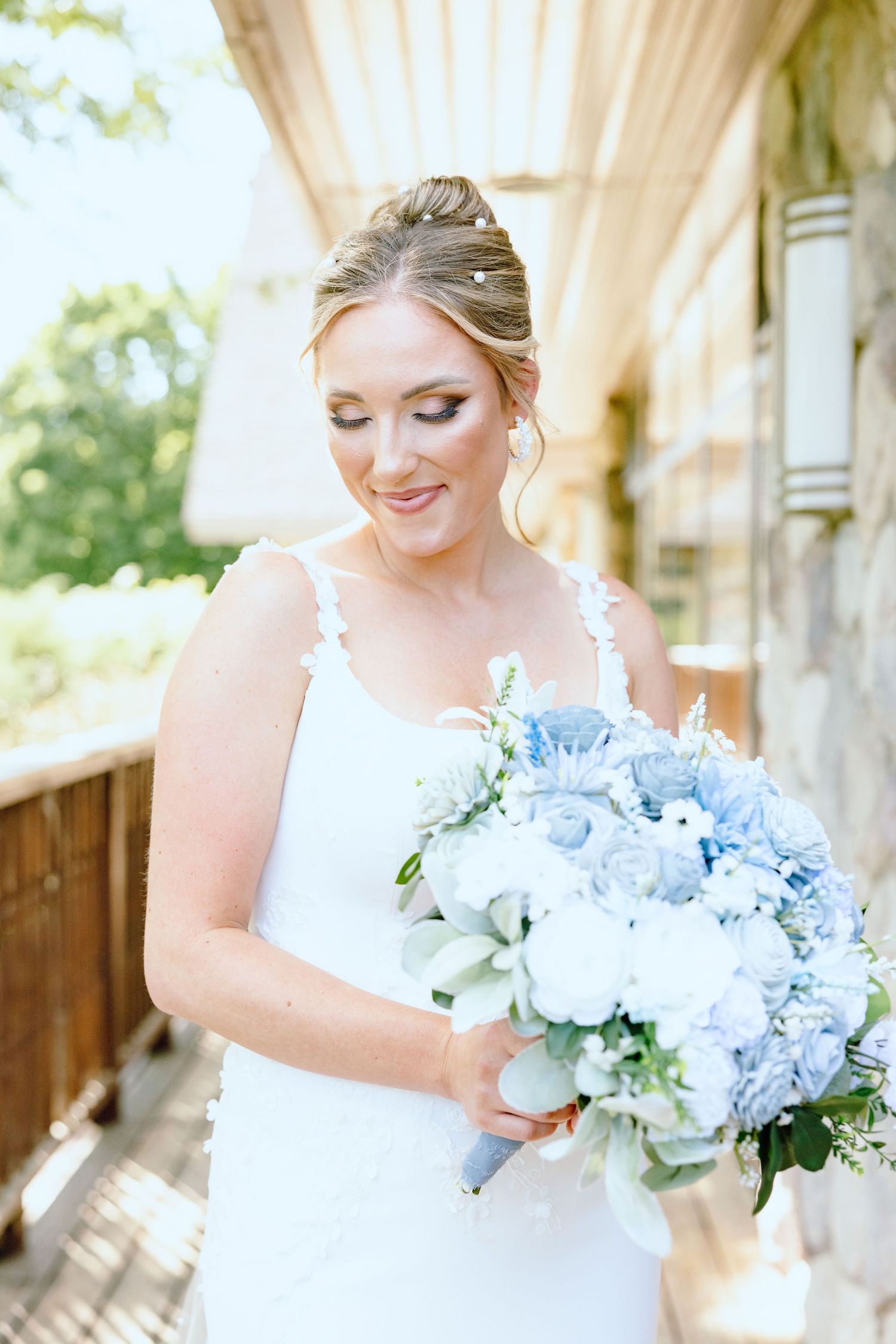 Bride holding bouquet at Lapeer Country Club wedding in Michigan