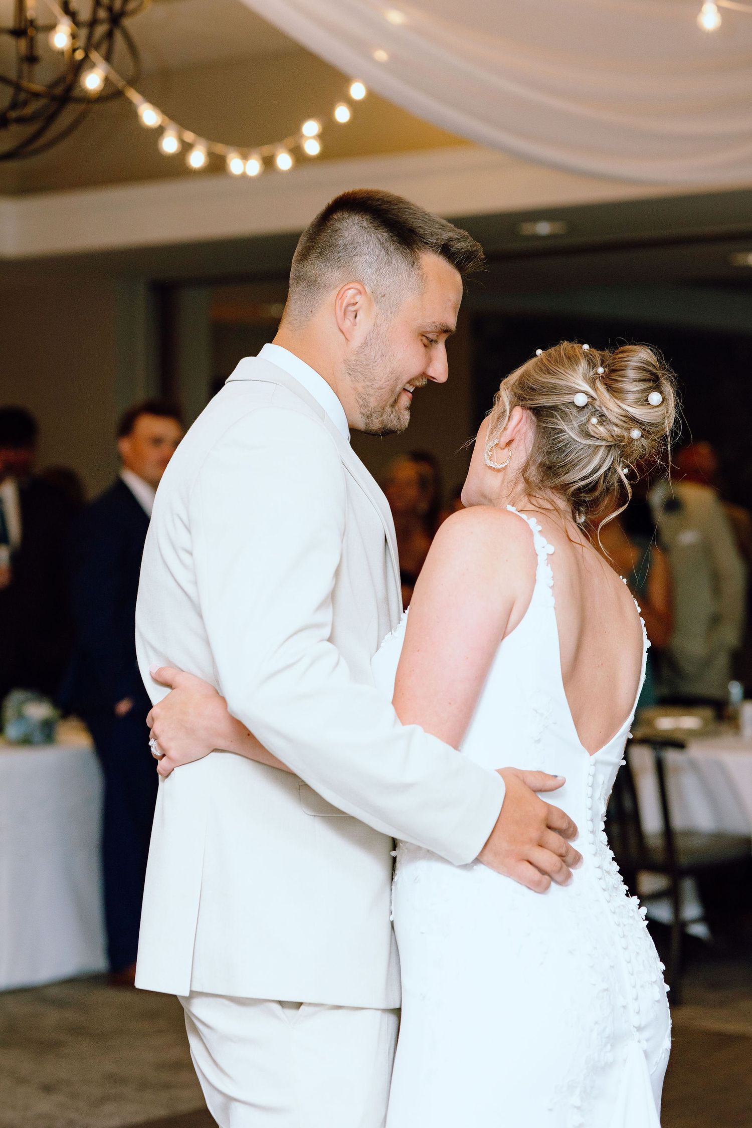Married couple dancing during reception at Lapeer Country Club wedding in Michigan