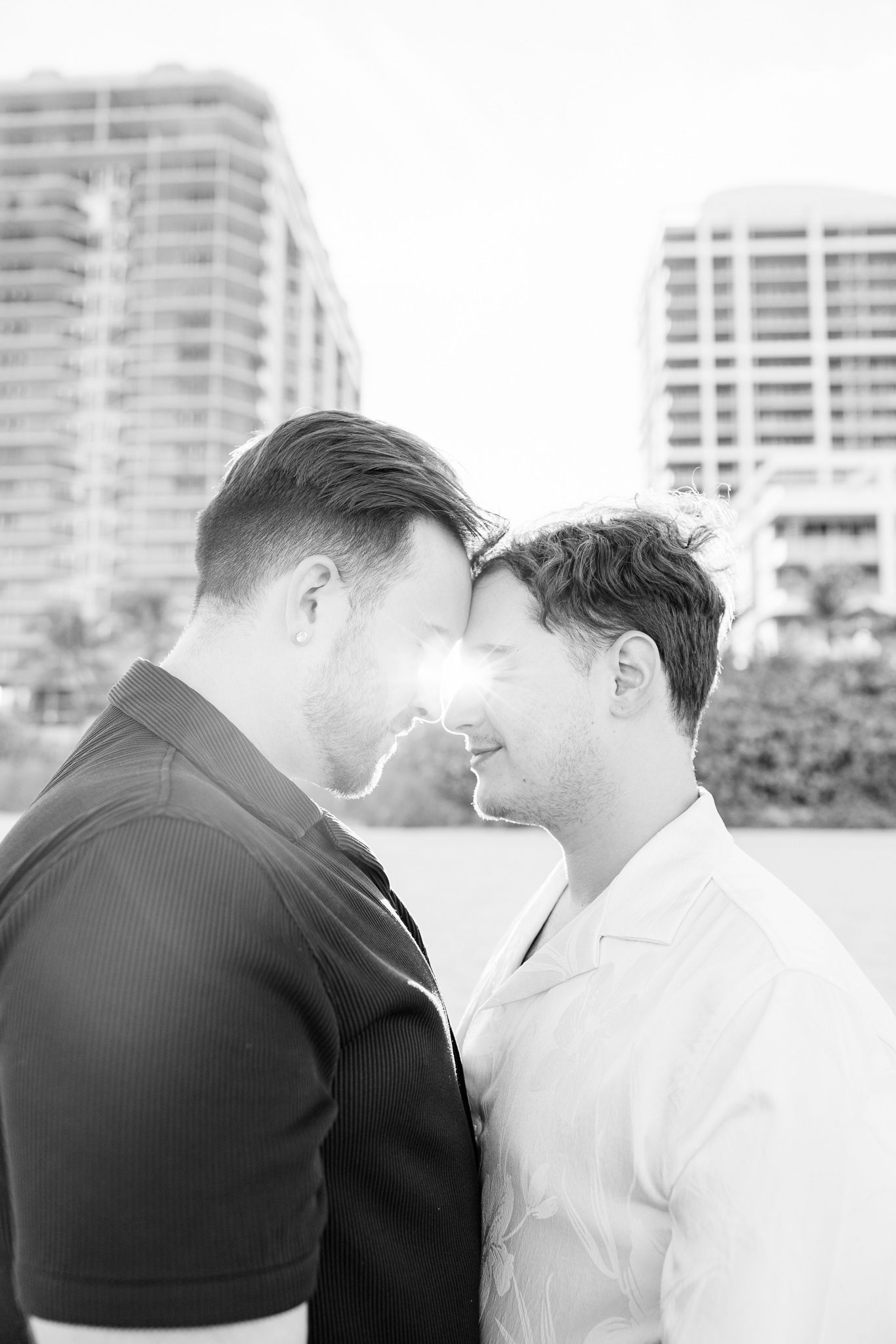 Gay couple touching foreheads at North Miami Beach in Florida