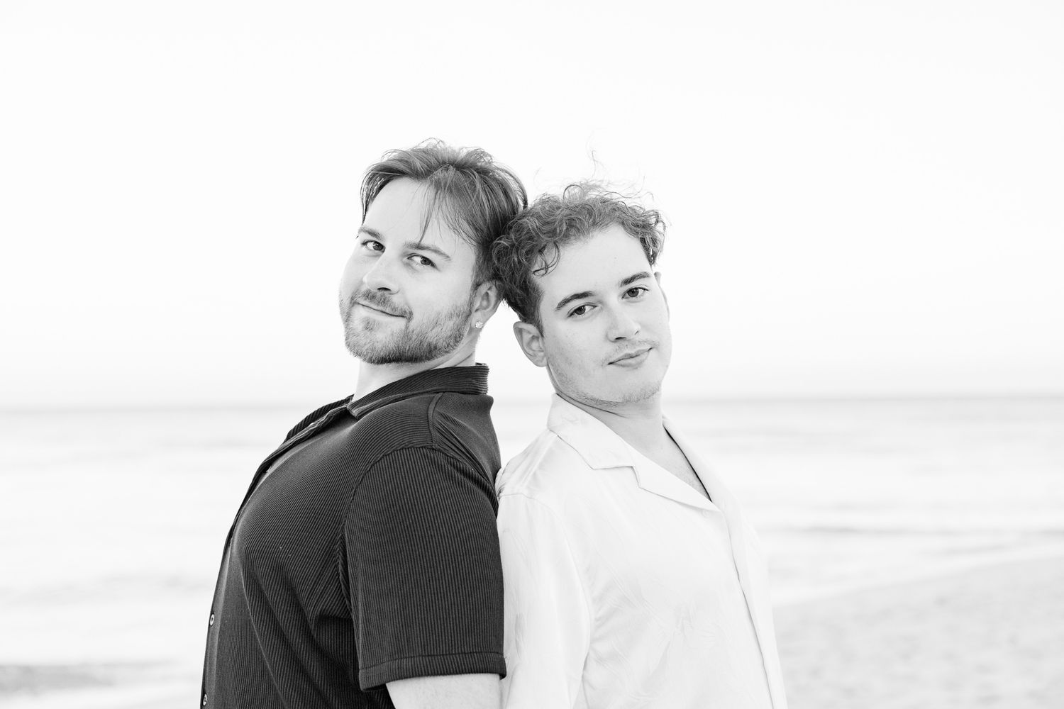 LGBTQ+ standing back to back on North Miami Beach in Florida