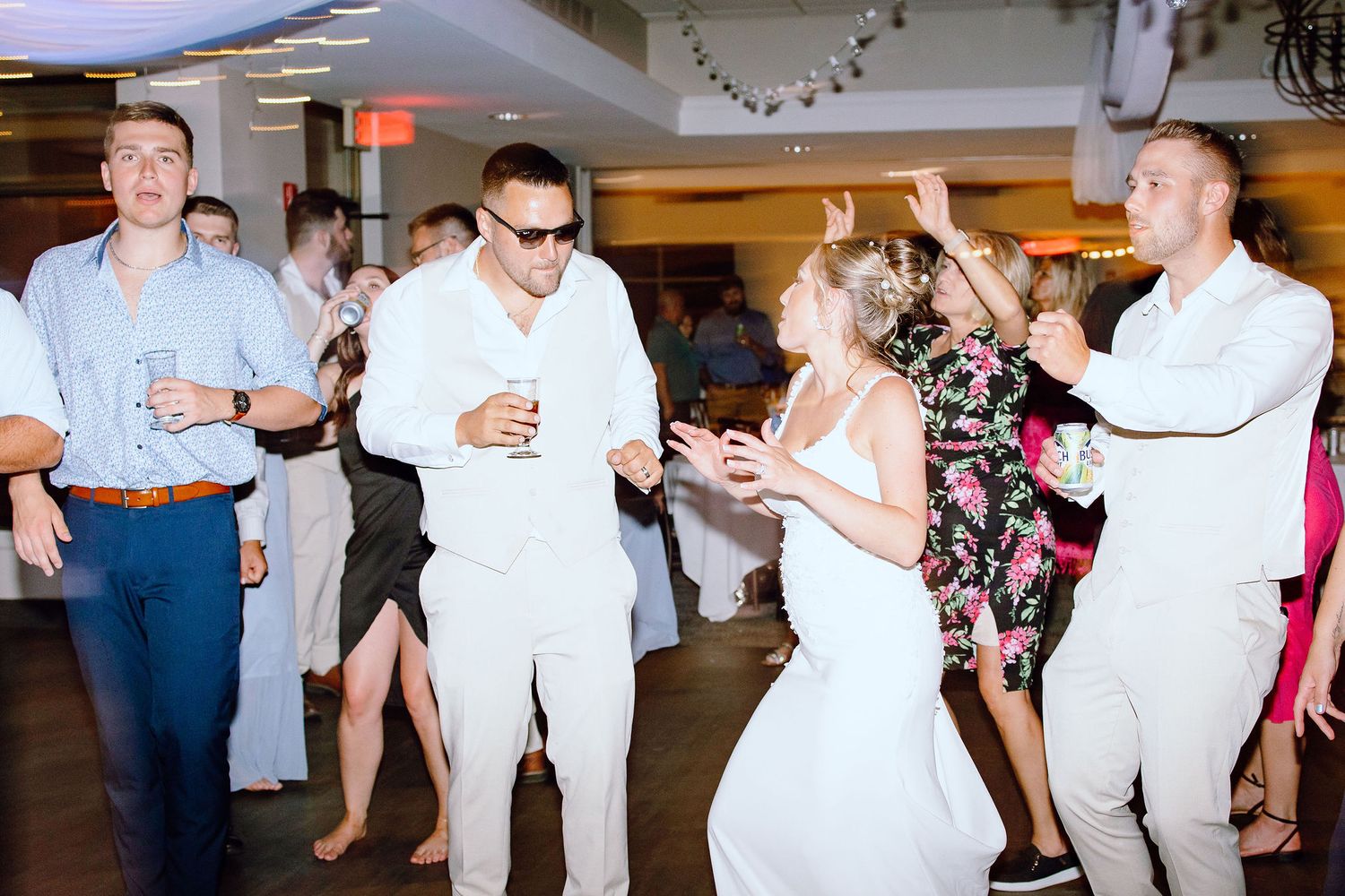 Married couple dancing during reception at Lapeer Country Club wedding in Michigan