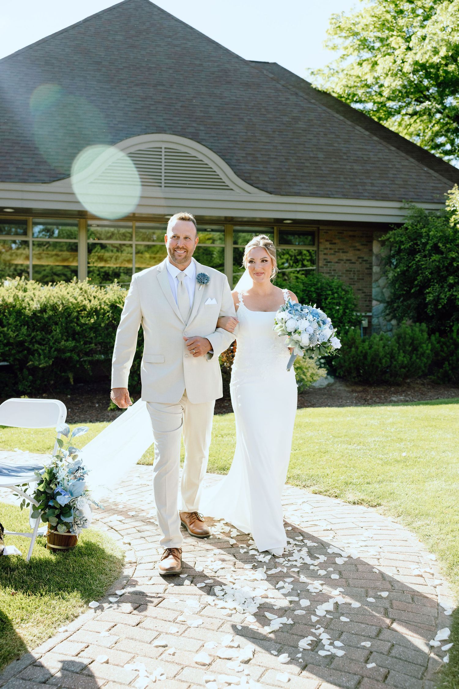 Bride walking down aisle at Lapeer Country Club wedding in Michigan