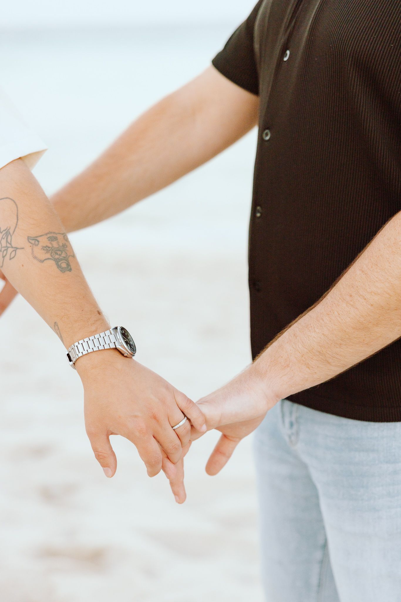 Detail photo of couple's hands and rings in North Miami Beach, Florida