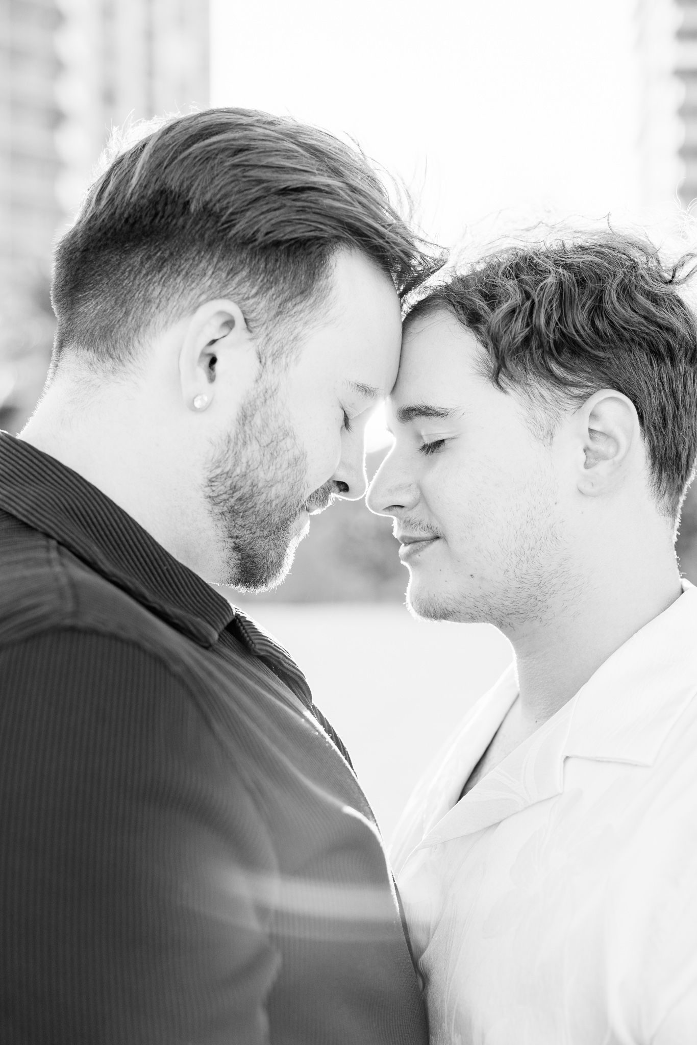 Gay couple touching foreheads at North Miami Beach in Florida