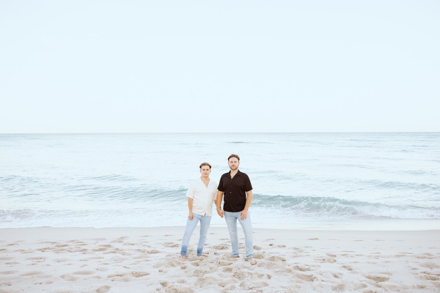 Gay couple holding hands at North Miami Beach in Florida