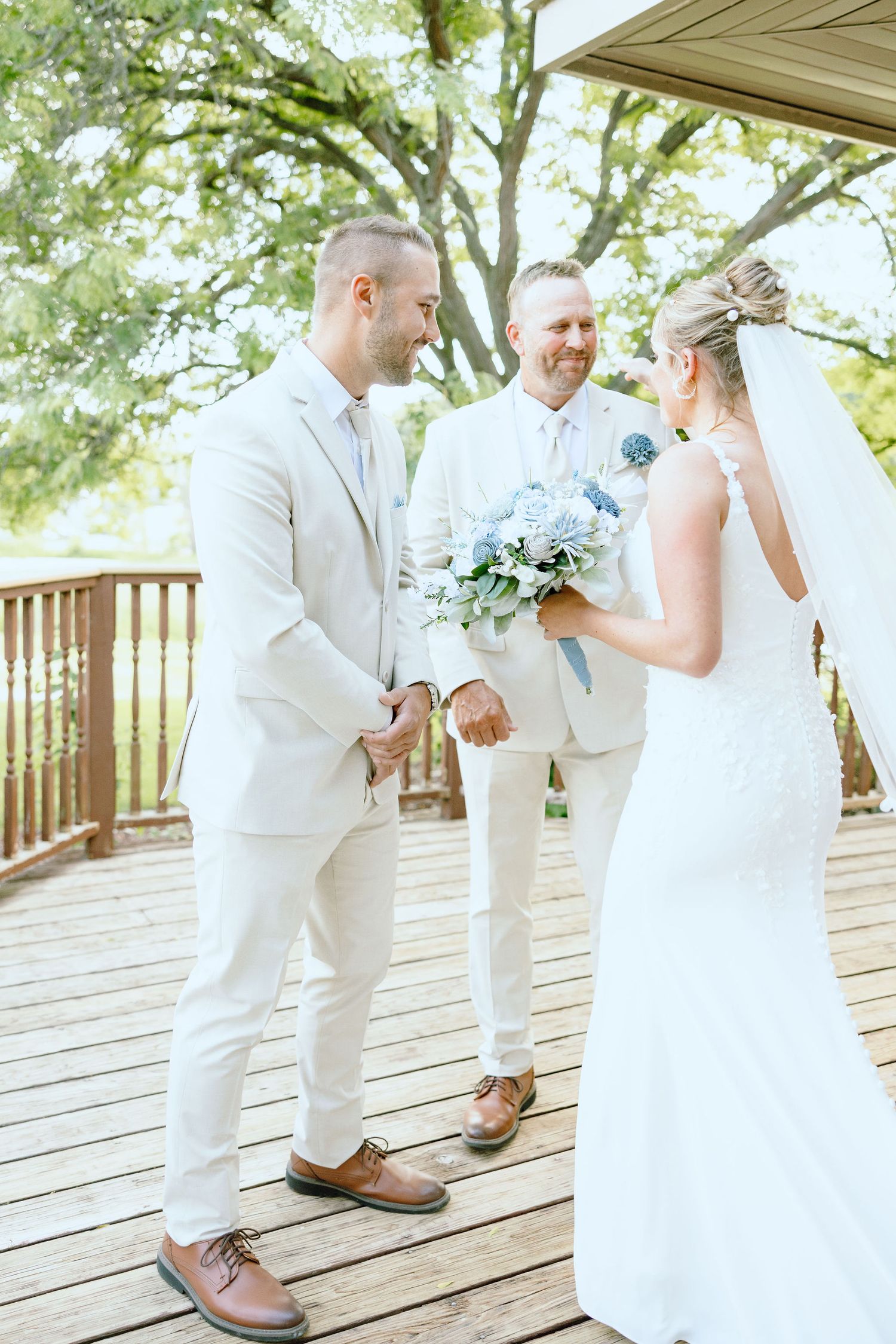 Bride and father first look at Lapeer Country Club wedding in Michigan