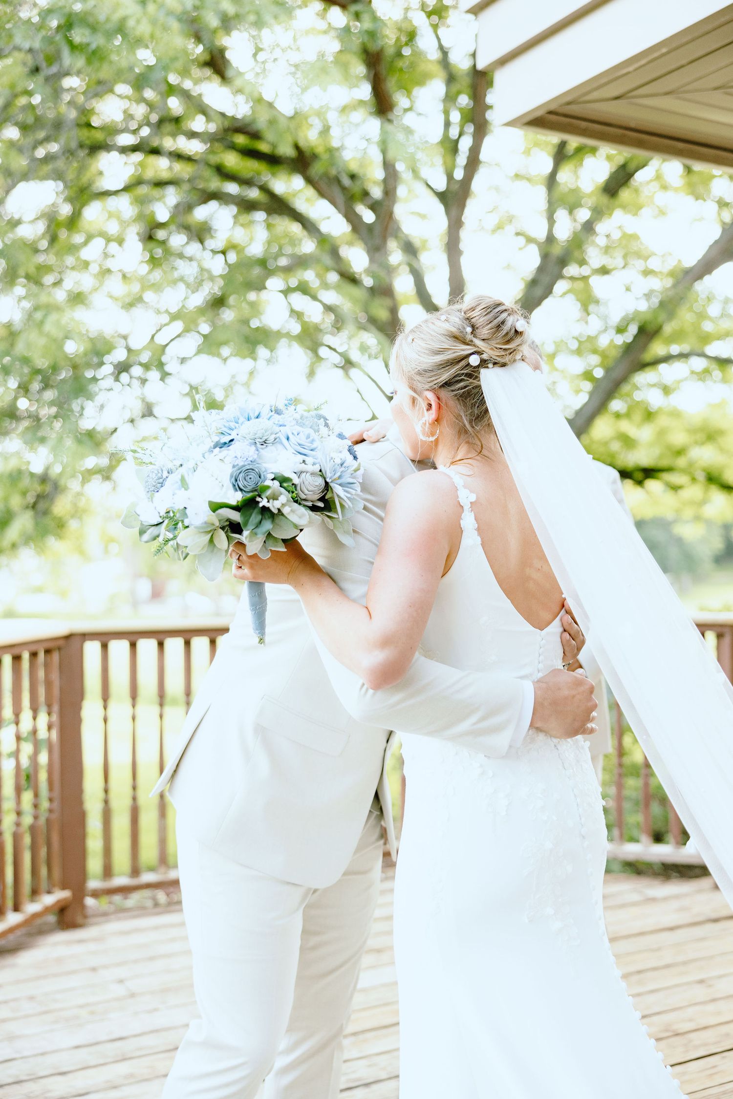 Bride and father first look at Lapeer Country Club wedding in Michigan