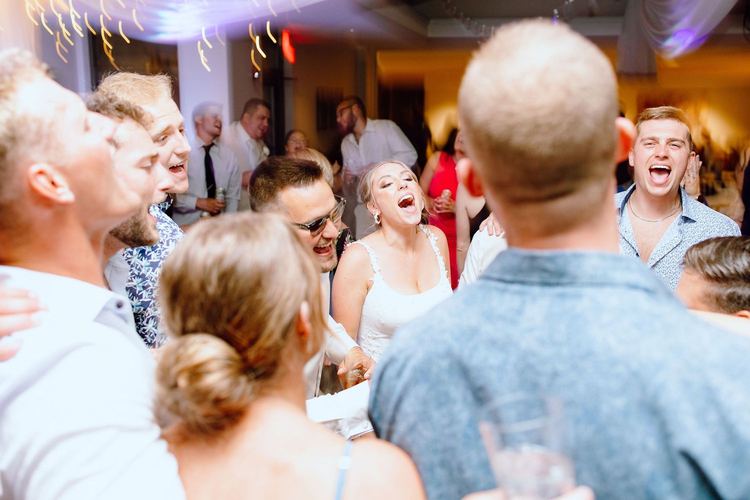 Married couple dancing during reception at Lapeer Country Club wedding in Michigan