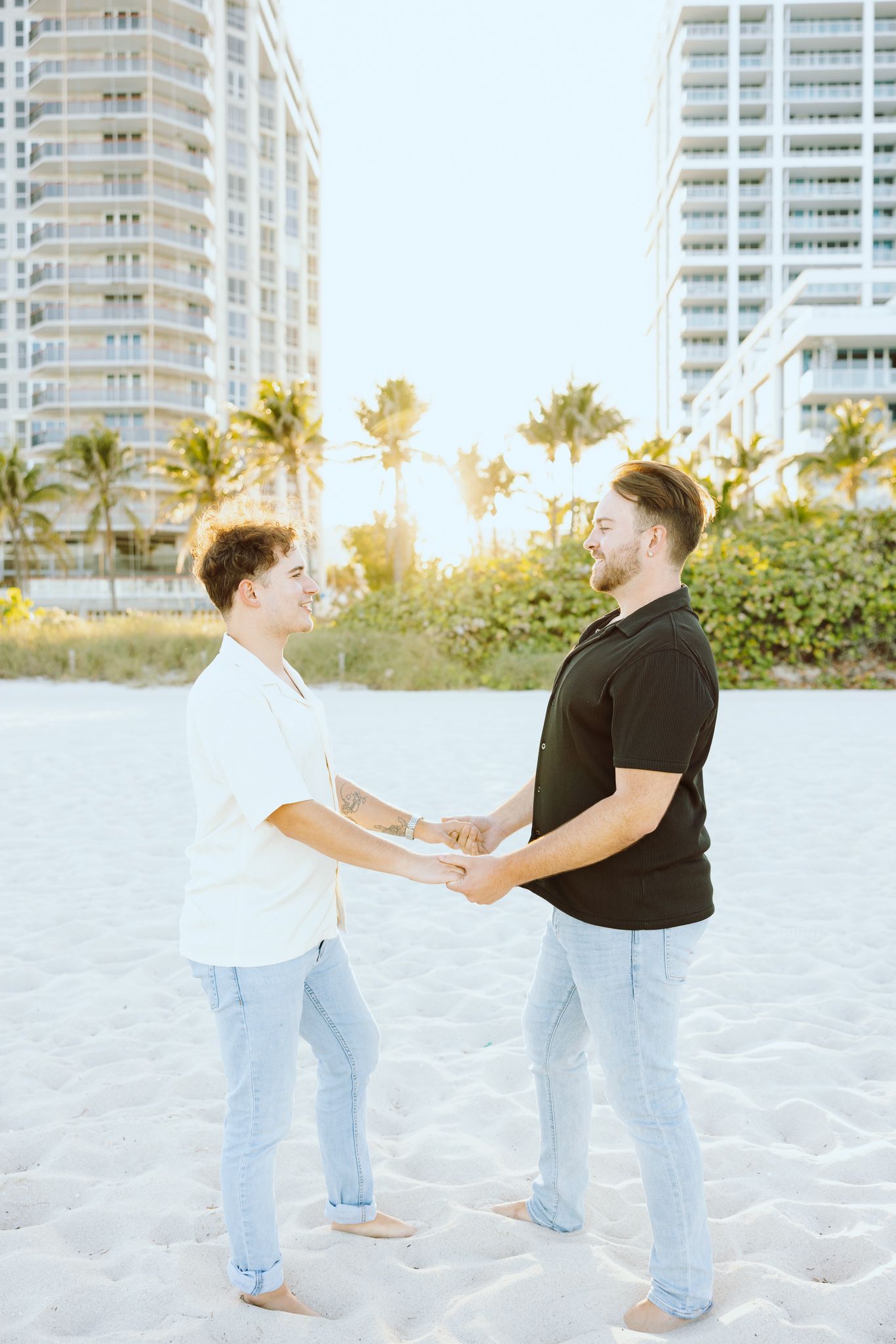 Gay couple holding hands at North Miami Beach in Florida