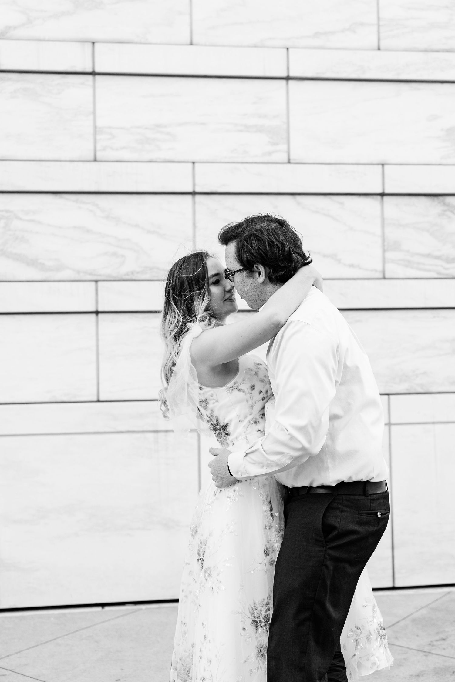 Engaged couple swing dancing at Detroit Institute of Arts engagement session in Detroit, MI