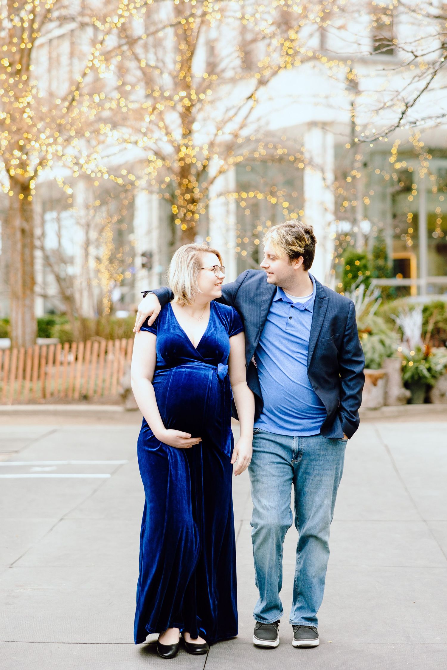 Couple walking in downtown Detroit during maternity session